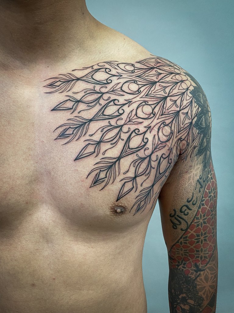 Blackwork Geometric Mandala Chest Tattoo 1