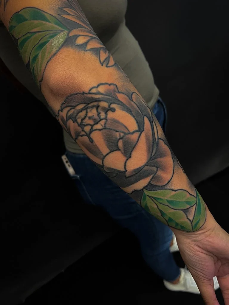 Floral black and grey sleeve with green leaves