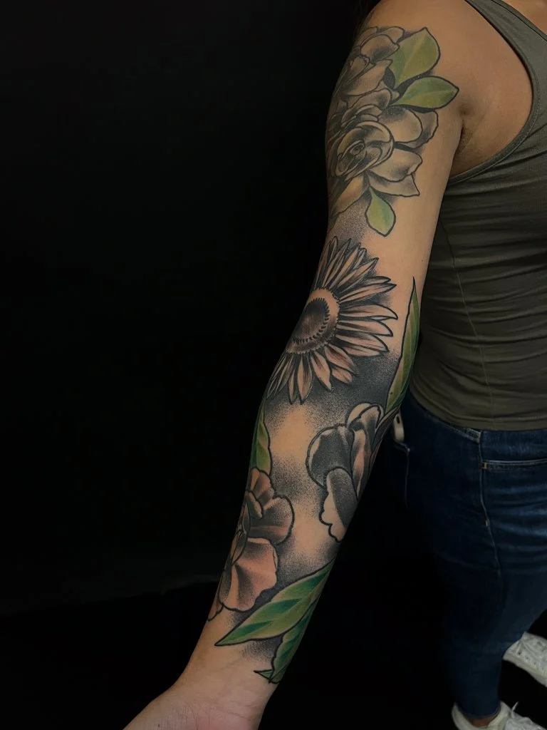 Floral black and grey sleeve with green leaves