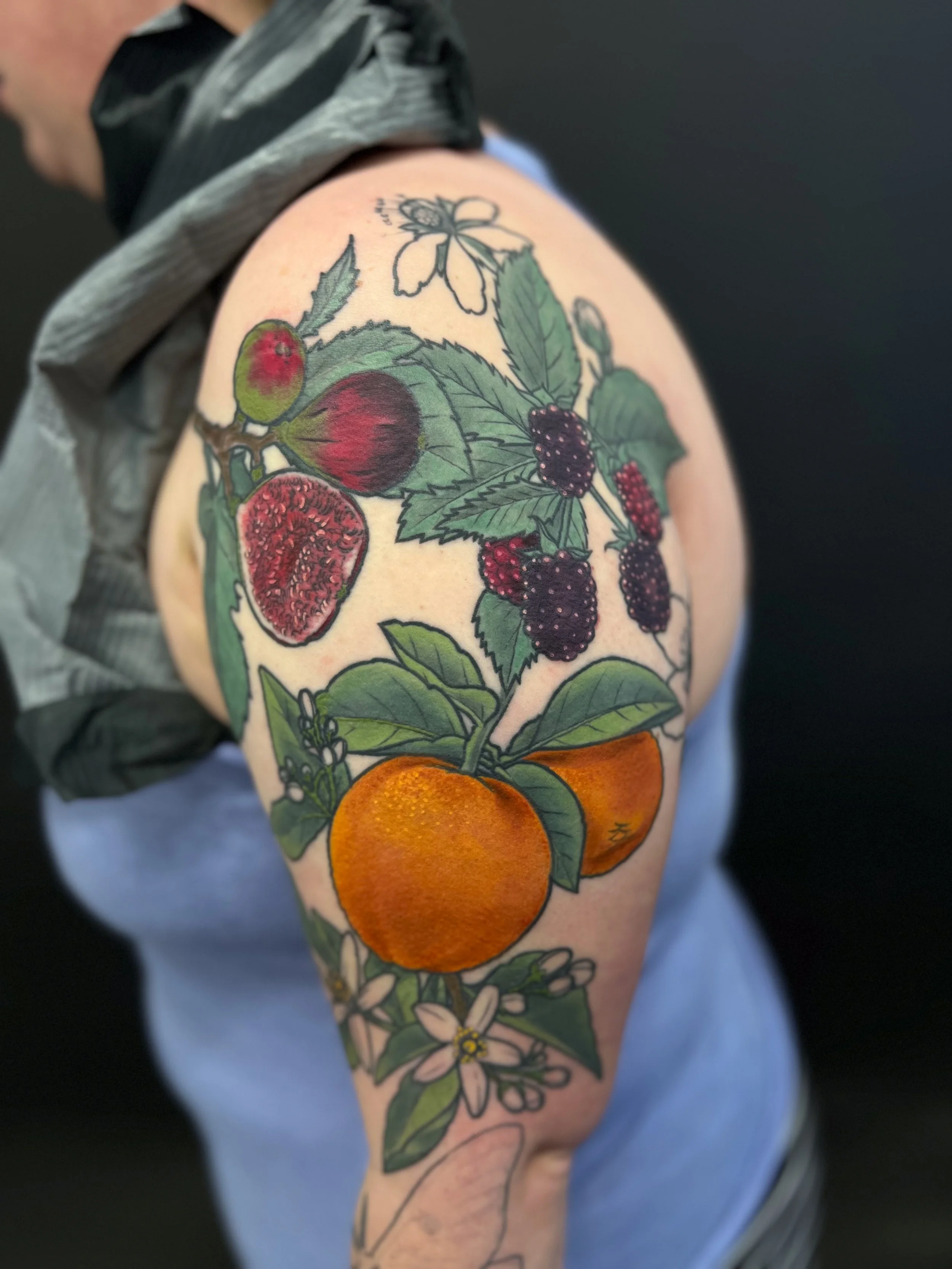 Orange orange blossom blackberry raspberry fig half sleeve tattoo