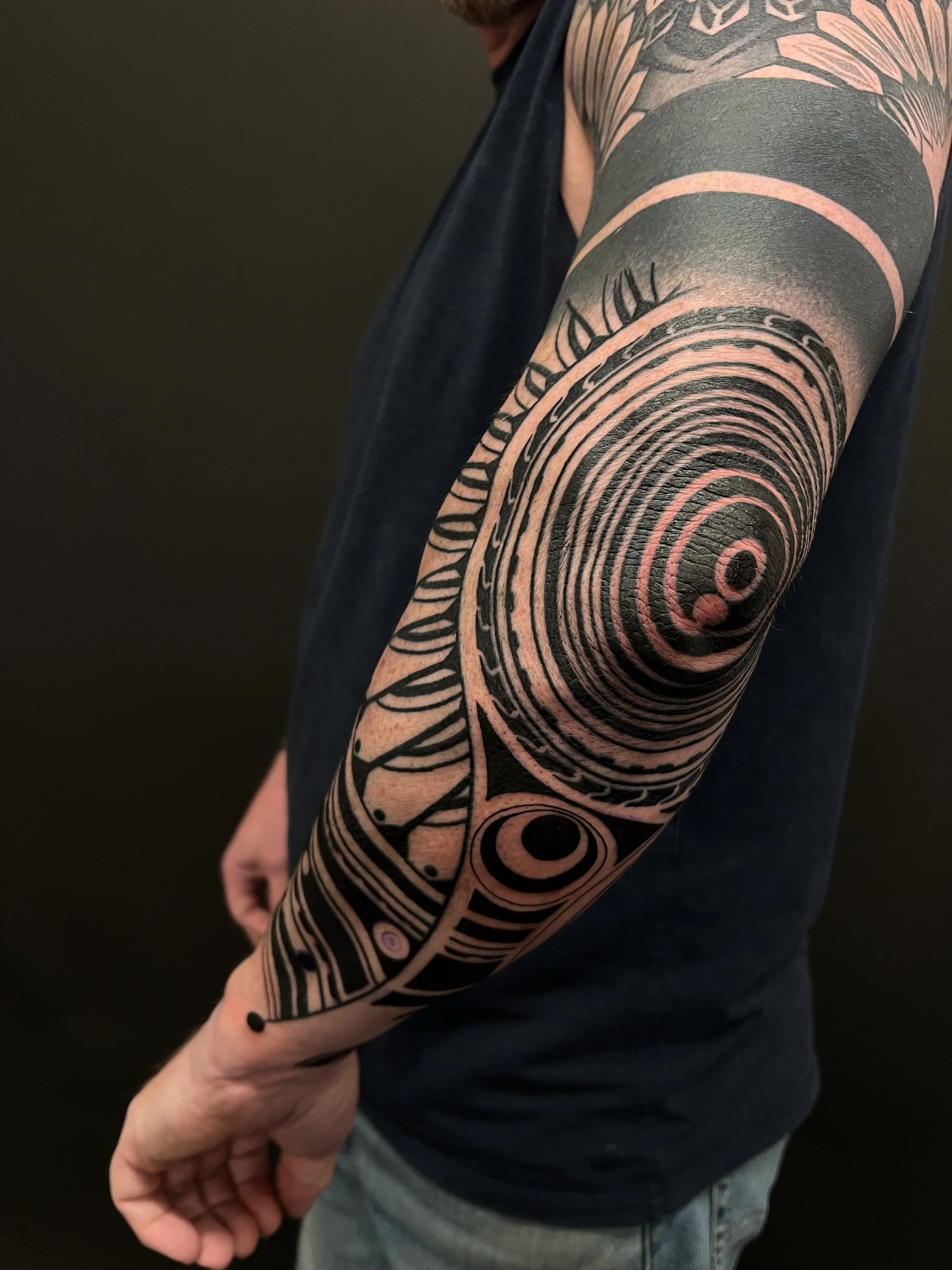 Abstract blackwork lineart forearm tattoo