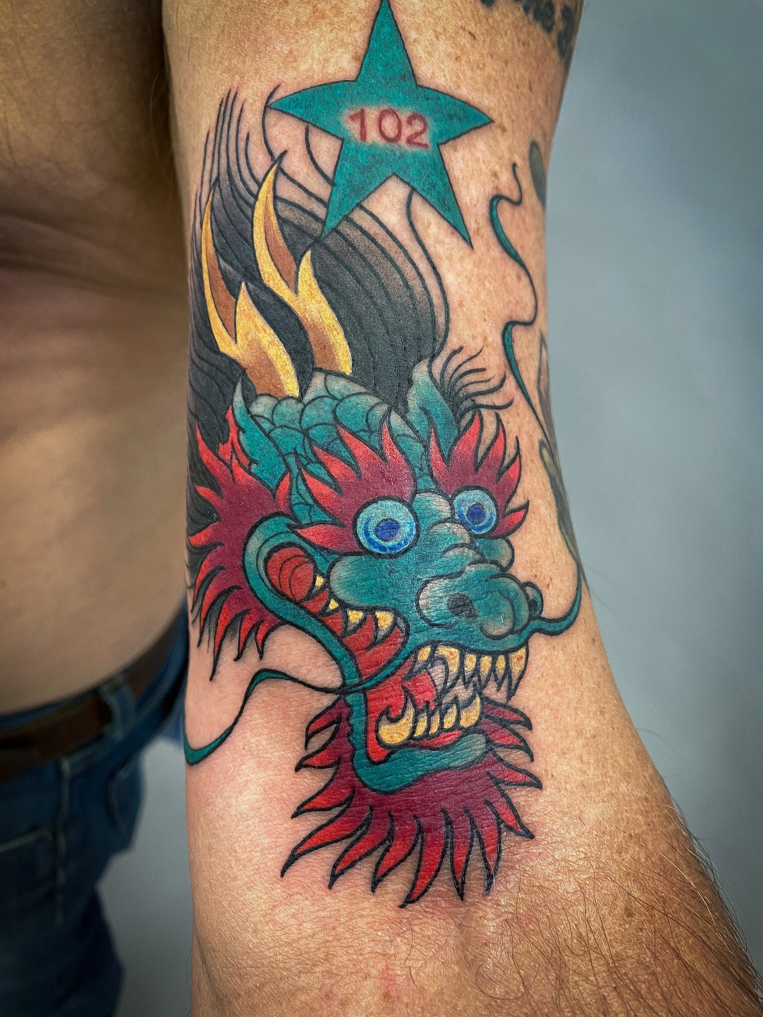 Traditional dragon head tattoo.jpg