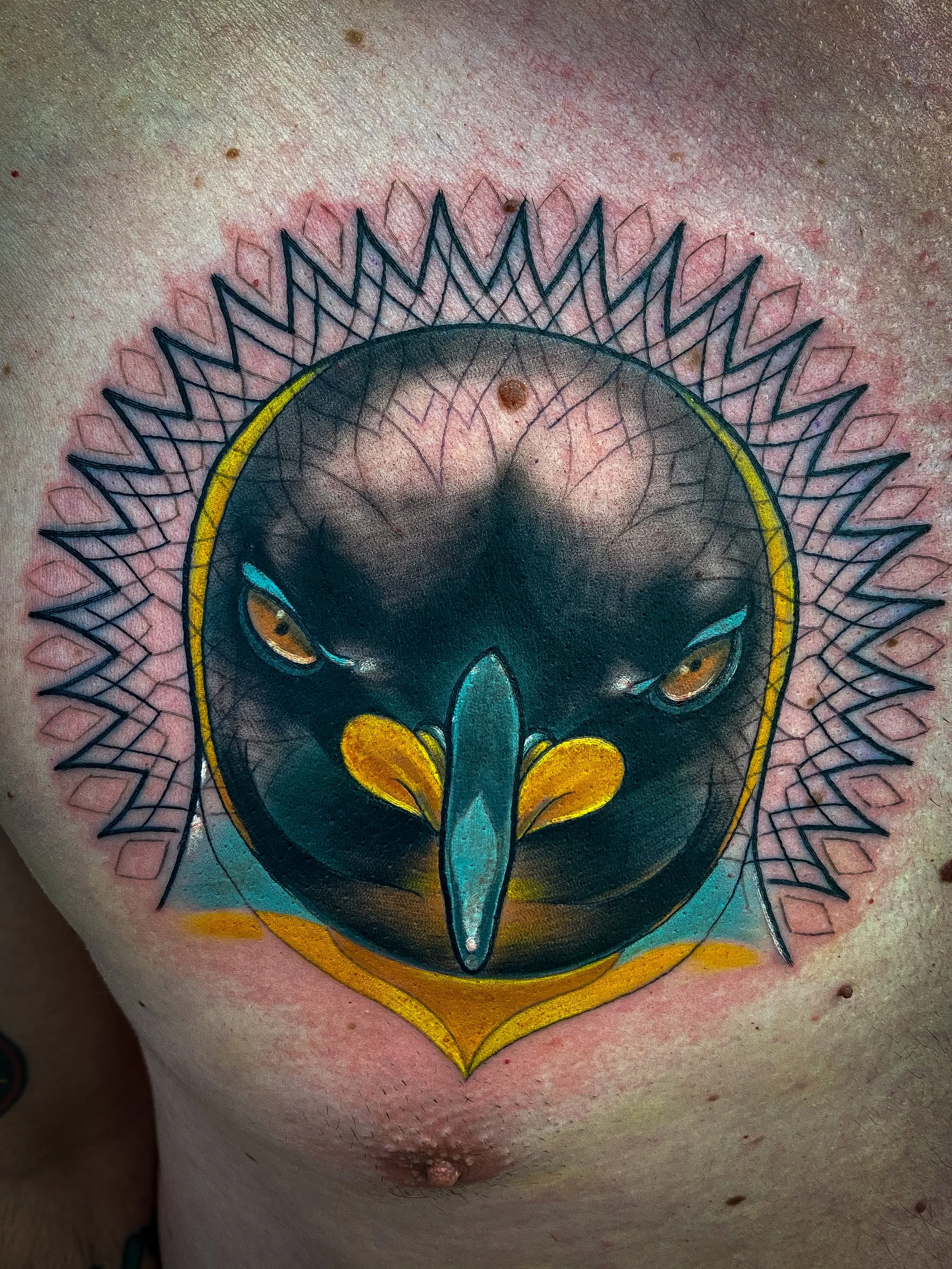 neotraditional geometric penguin tattoo.jpg
