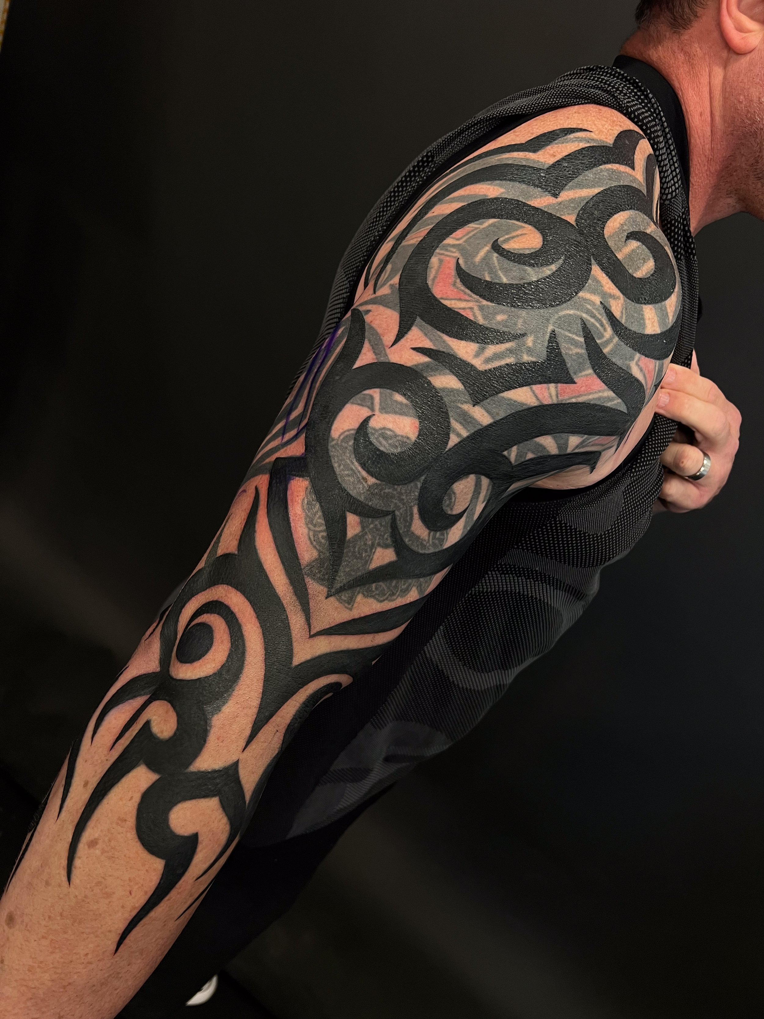 traditional tribal blastover tattoo.jpg