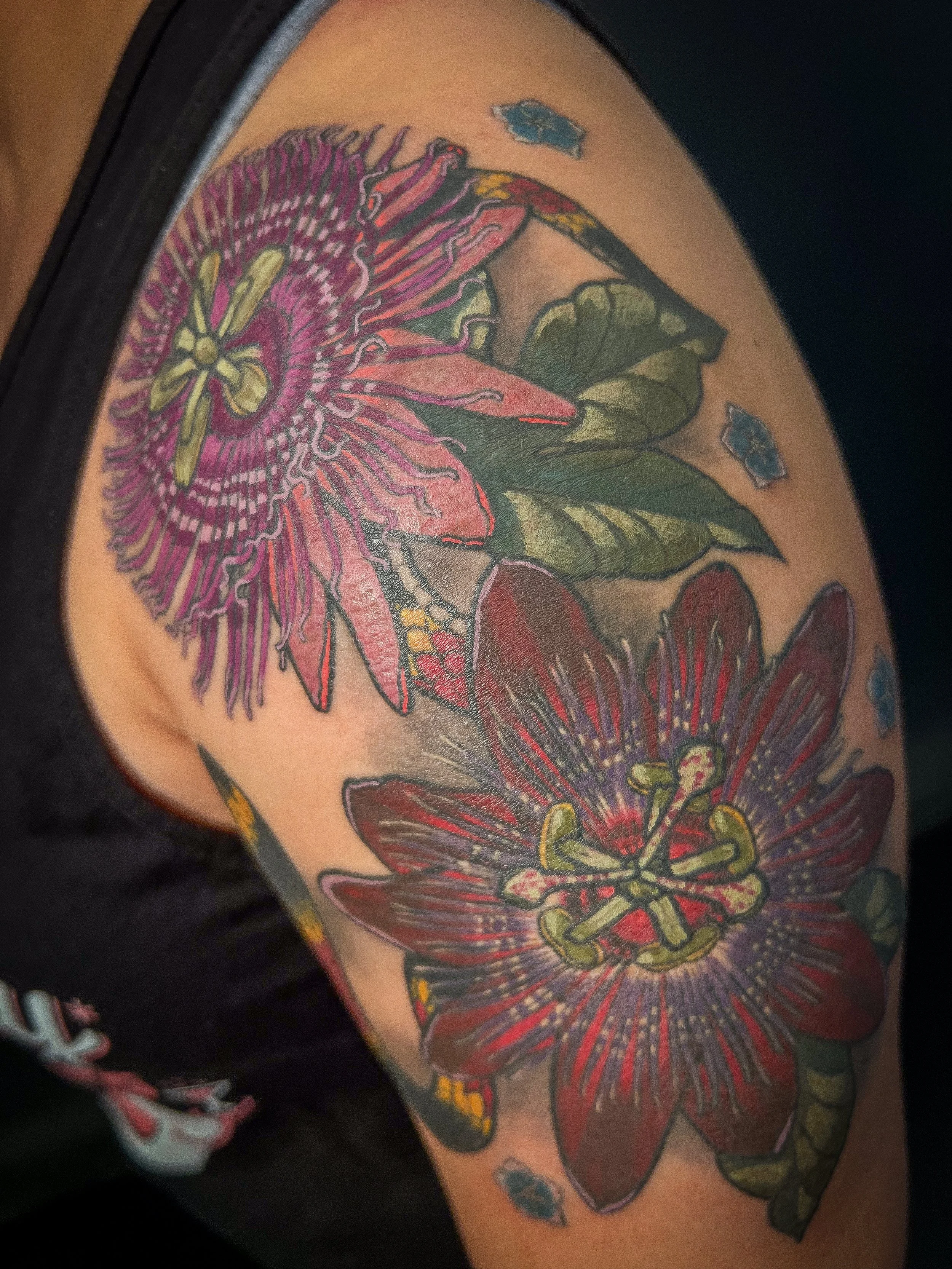 Passion flower and coral snake tattoo