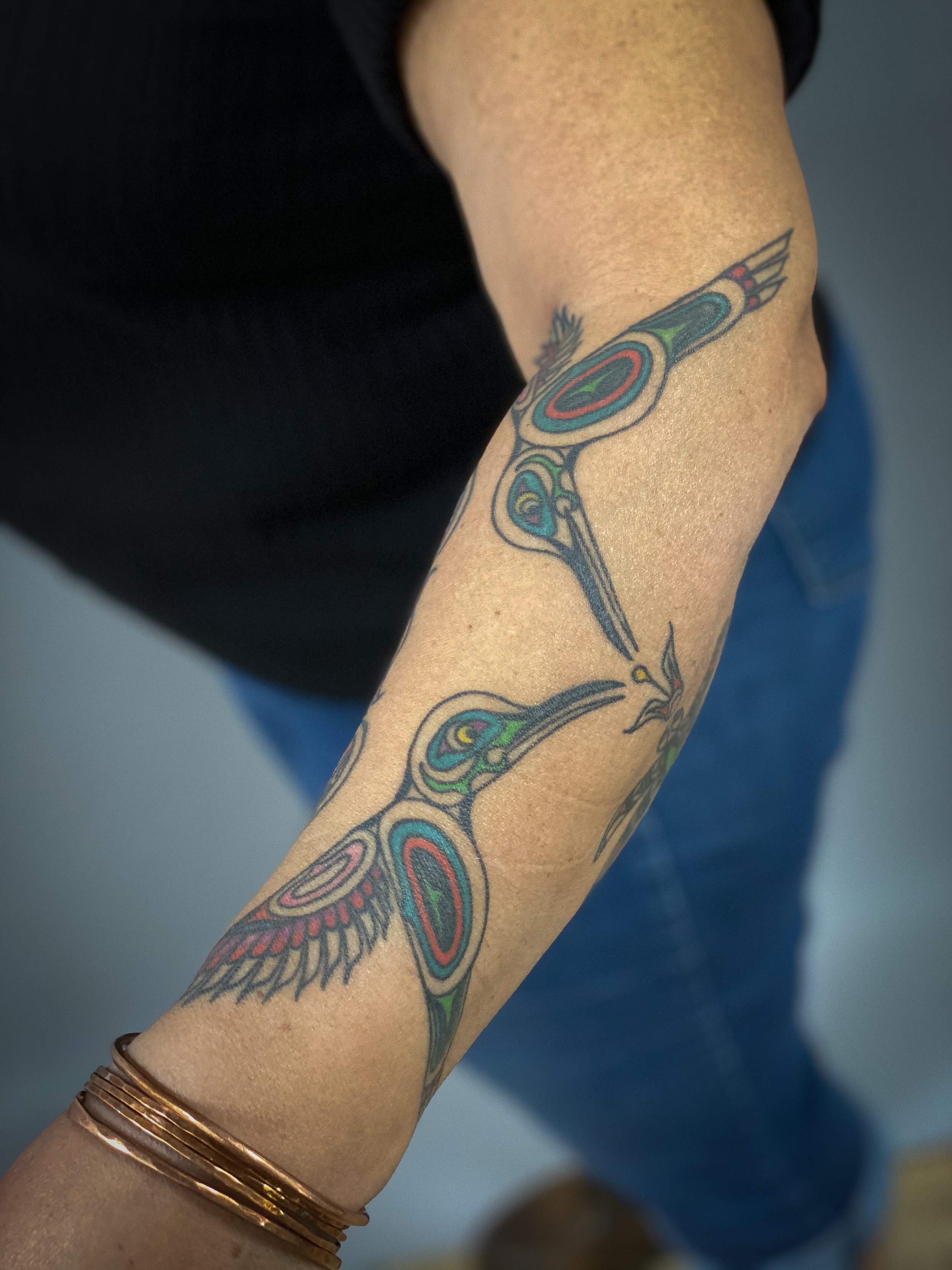 Haida tattoo hummingbird and owl forearm-1.jpg