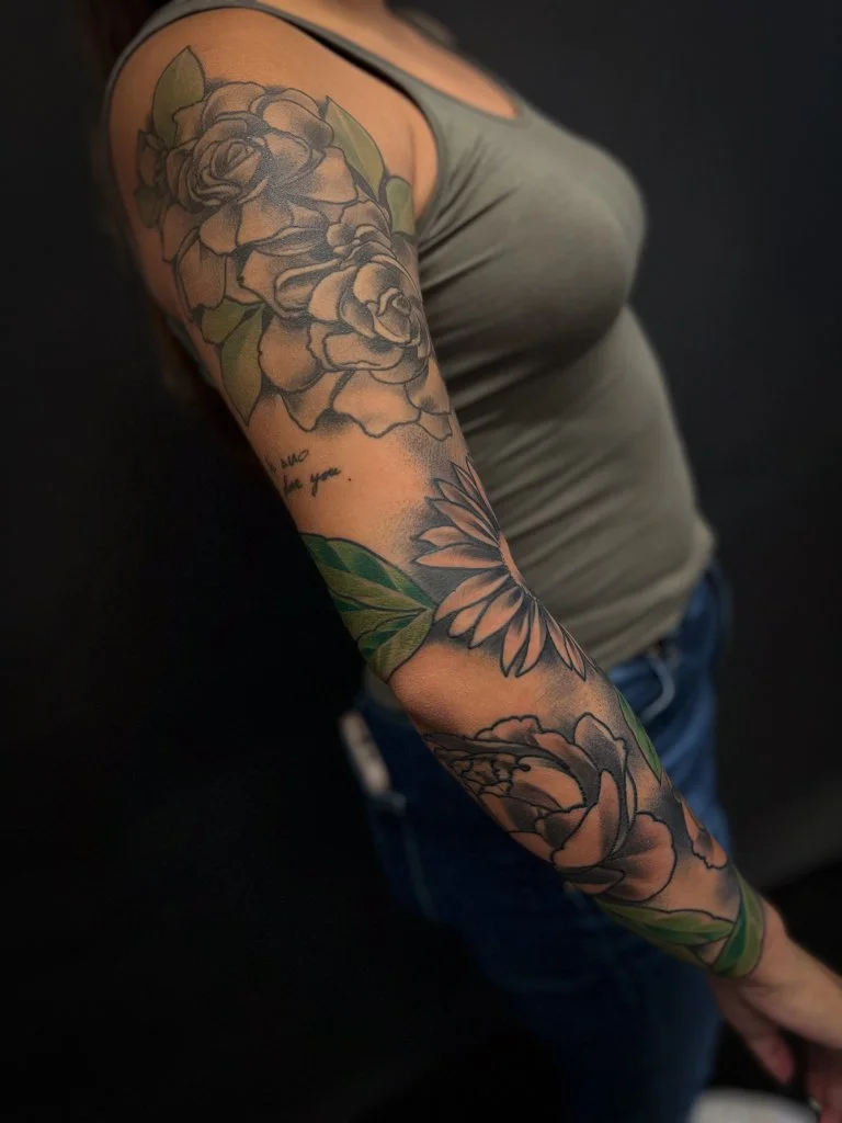 Floral black and grey sleeve with green leaves