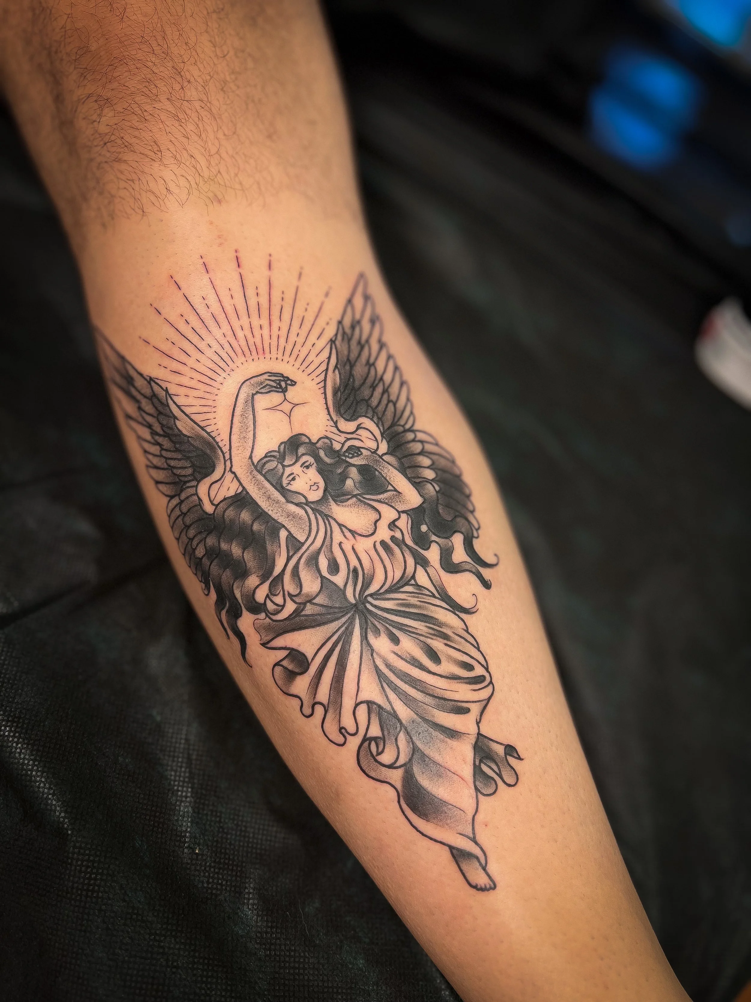 Traditional Blackwork angel tattoo.jpg
