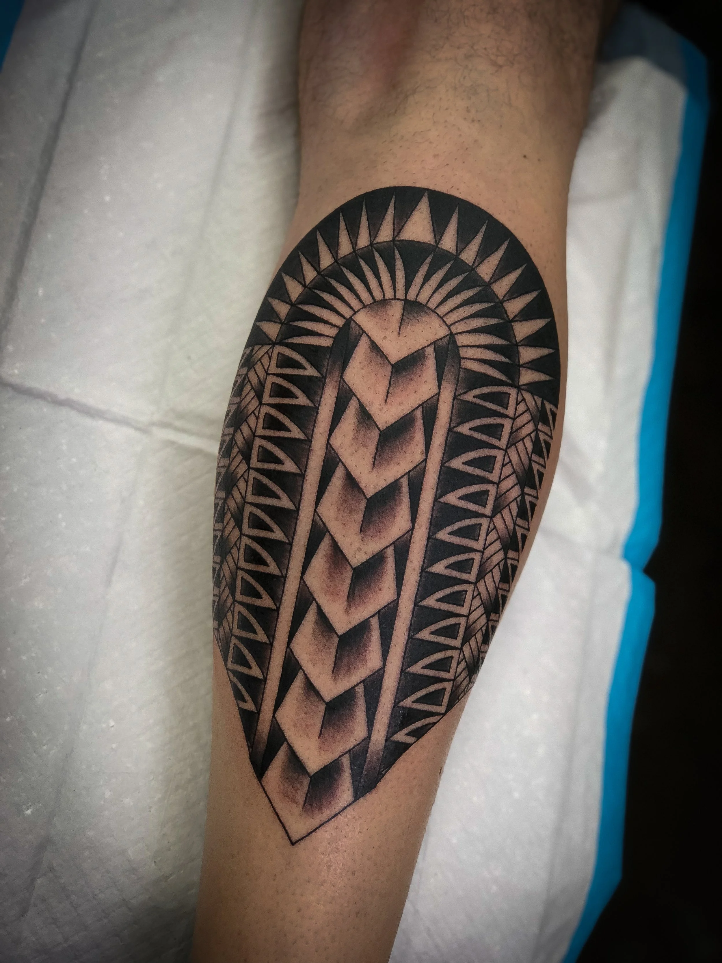 Polynesian geometric tattoo calf.jpg