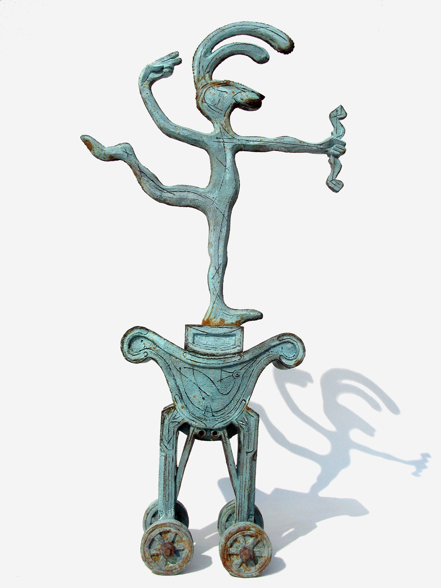  Panjandrum l &nbsp; ©&nbsp;  76 cm high x 39 cm wide  Unique  Two cartoon-like weather-vane hares “Pomp” and “Circumstance” take the guise of Eros the Archer on royal chariots.  This is no transportation fit for kings, but in the first image, a facs