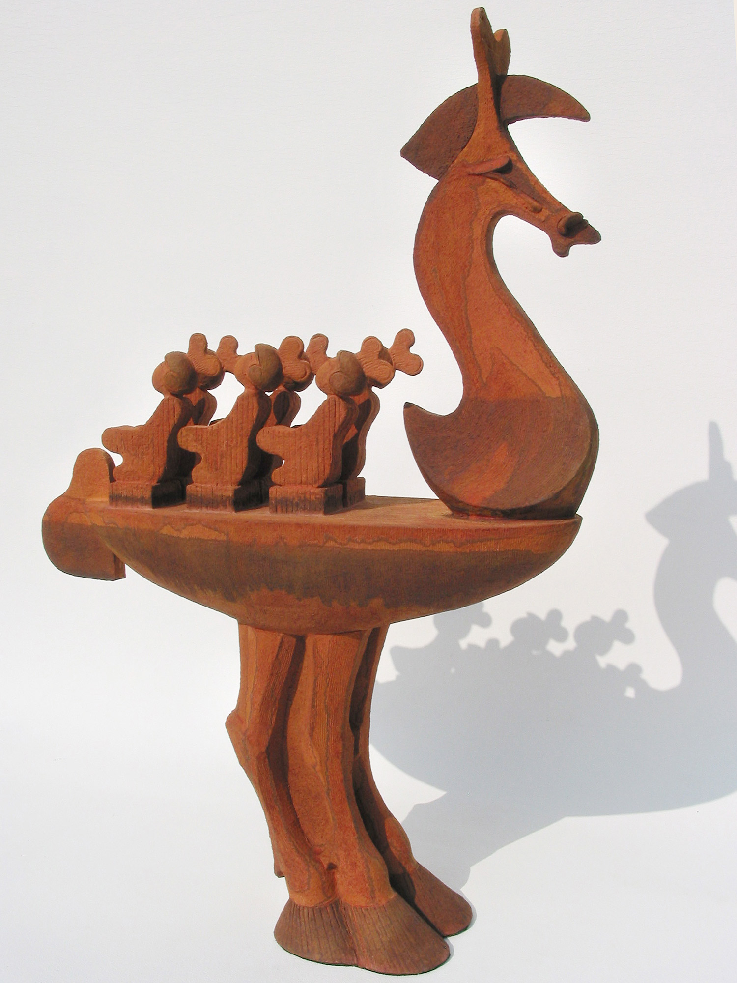 Seahorse © 79 cm high x 54 cm wide Unique A vessel with a horse-head prow and a horse-legged stand; on board, six rowers of Chinese origin. Understated in this eclectic mix are the the horsetail rudder and the heart-shaped helmets that are disguised, wind-up toy keys. This piece implies deception, combining the charm of a mechanical toy with the presence of an instrument of plunder. A variation on a Greek offering.