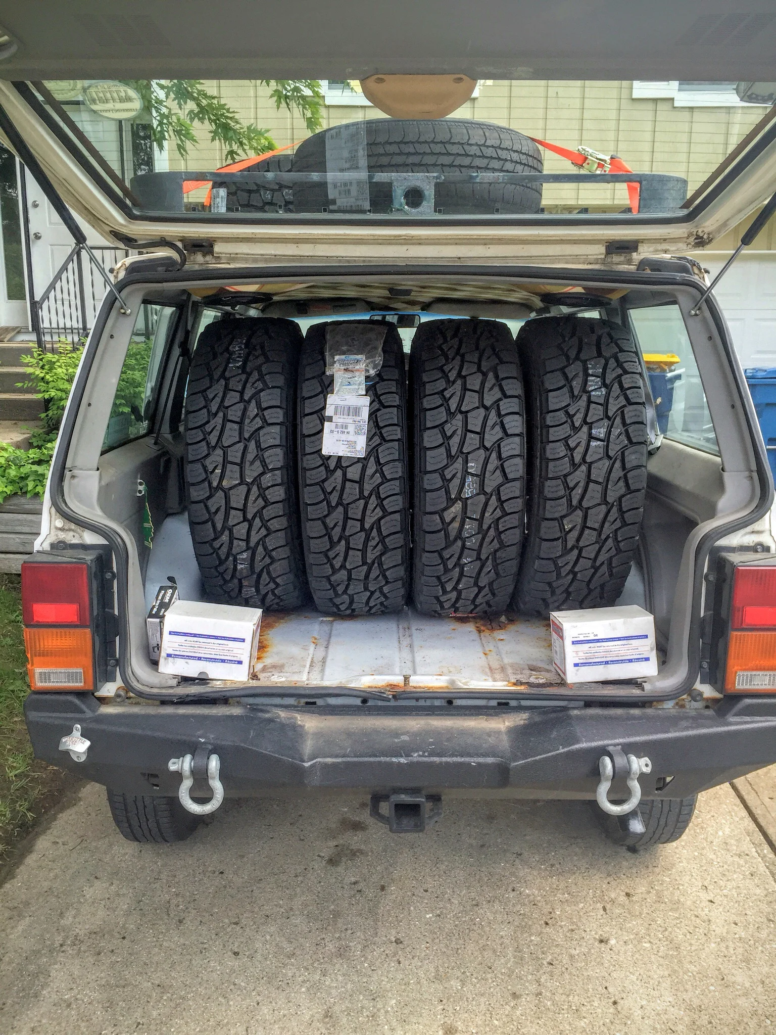 Off to PepBoys to get tires mounted. Found a bunch of rust on the floor. More on this later...