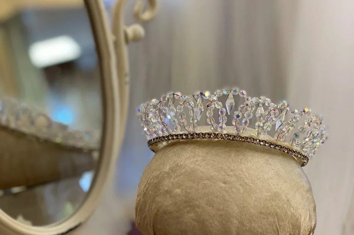 1961 AB crystal crown with rhinestone cupchain band on a form waiting to be restyled.