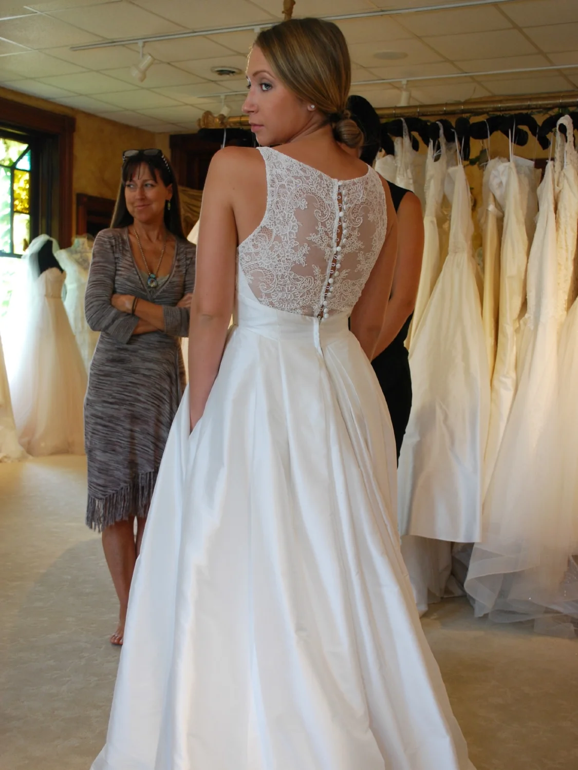 Box pleats, pockets, and a lace back...true love!
