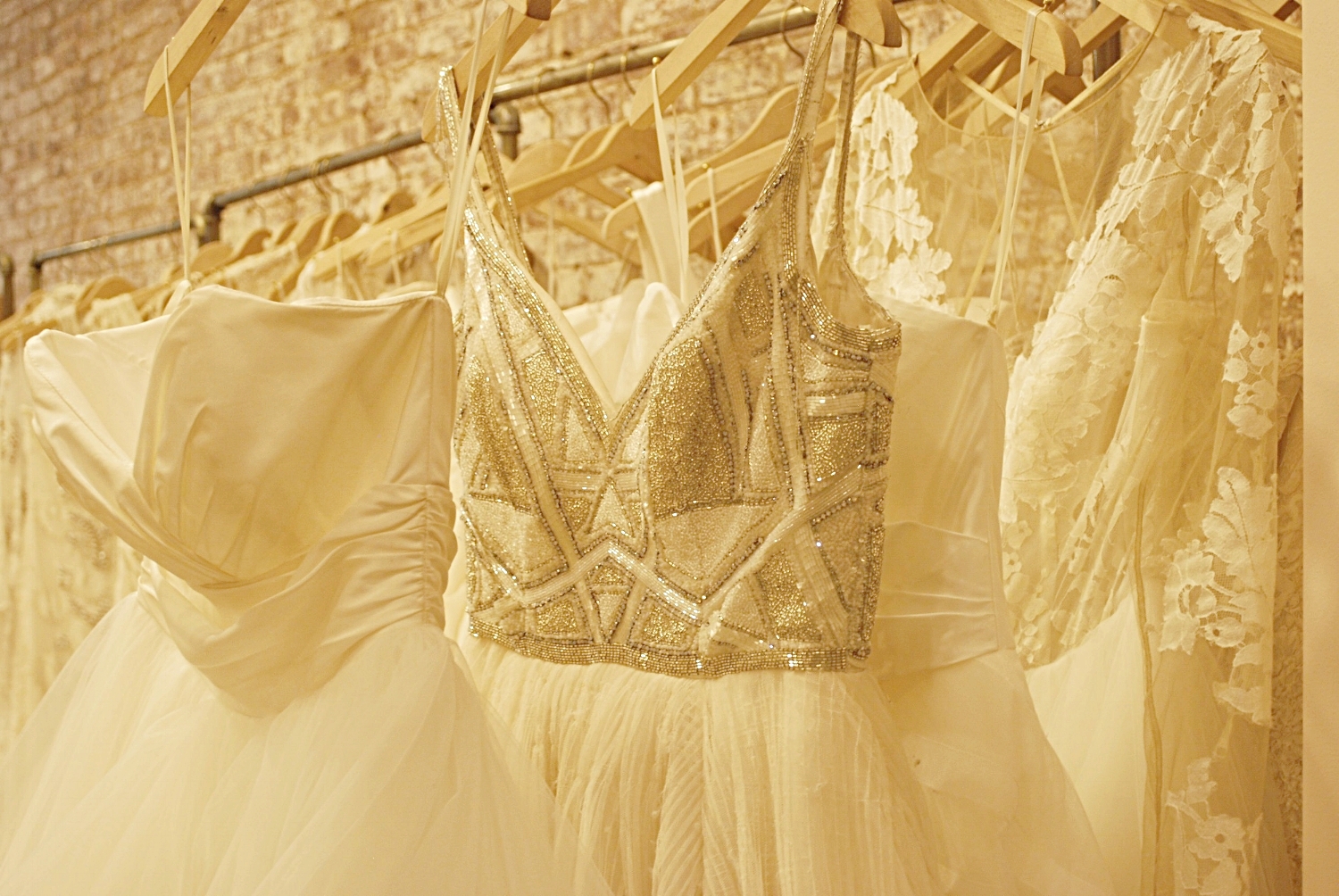 Different necklines, bodices, fabrics, and silhouettes were ready for the fitting room.