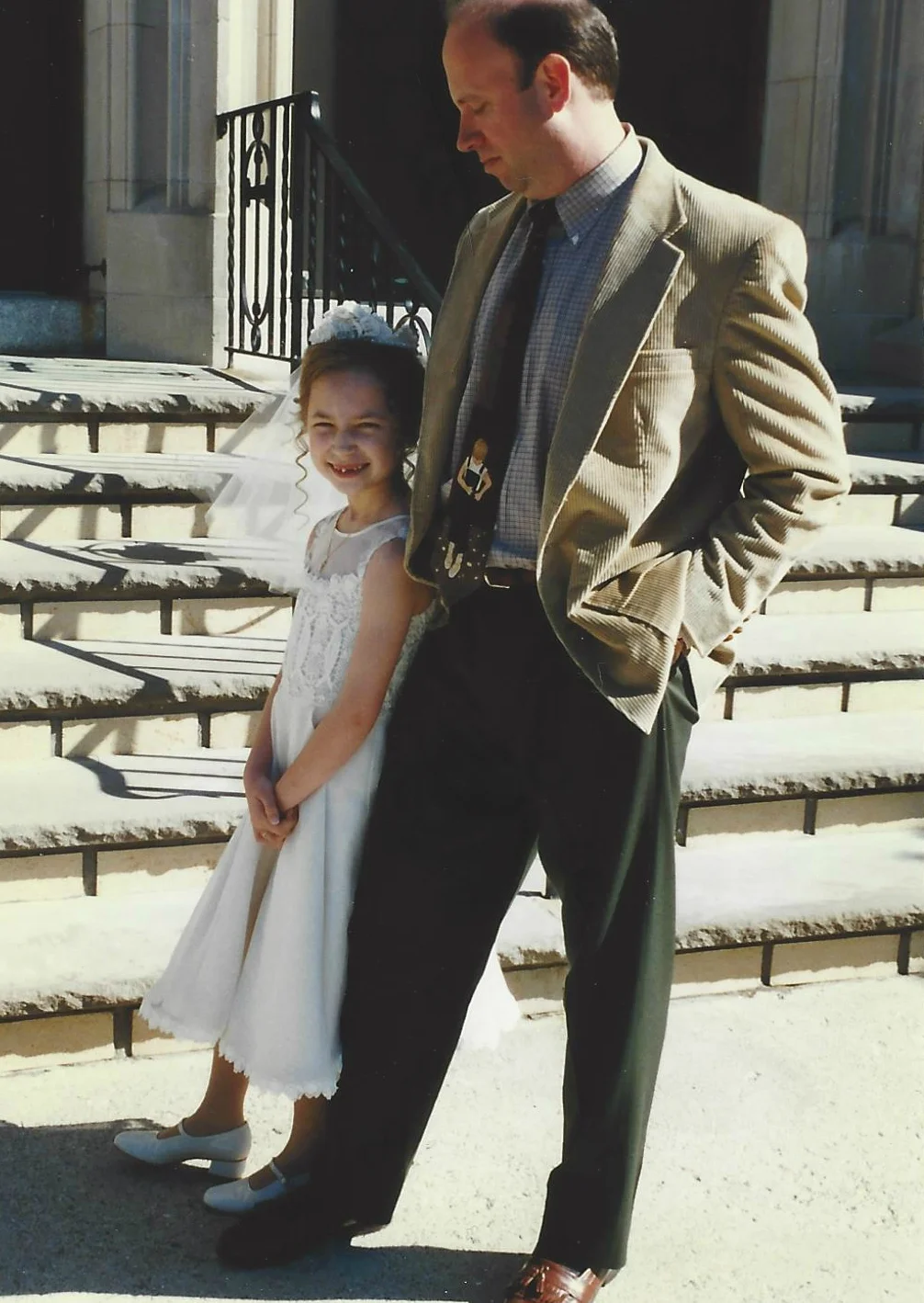 Brielle and her father, Jeff, at St. Mary's Church for her First Holy Communion in 1997.