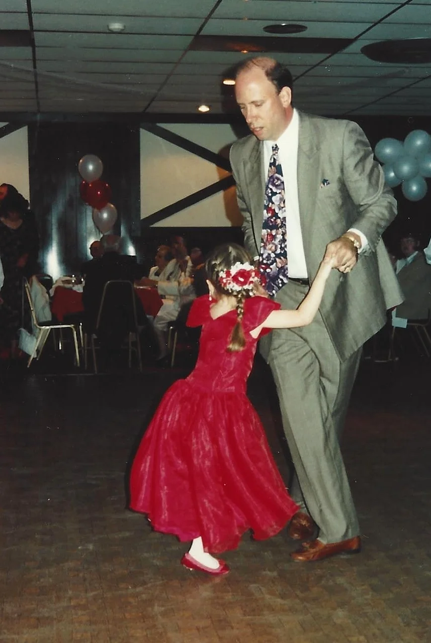 Dance fever began at a young age. Brielle as a little flowergirl dancing with her dad in 1993.