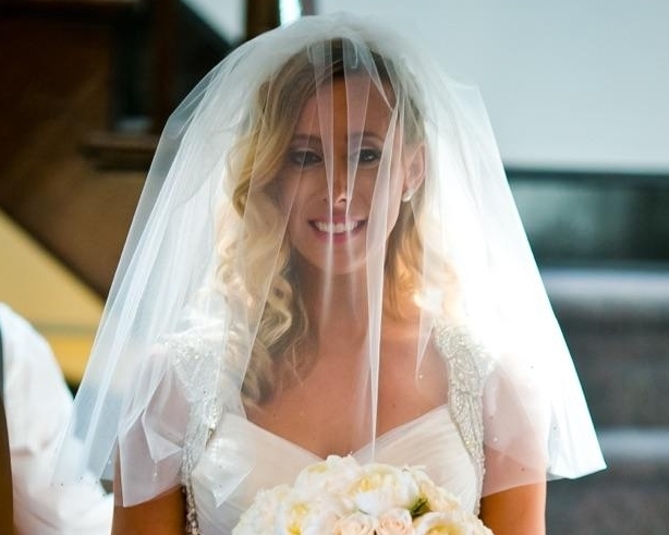 We designed a short, stylish blusher for Angela. It went perfectly with her wedding day look. Photo by MPW Media Group.