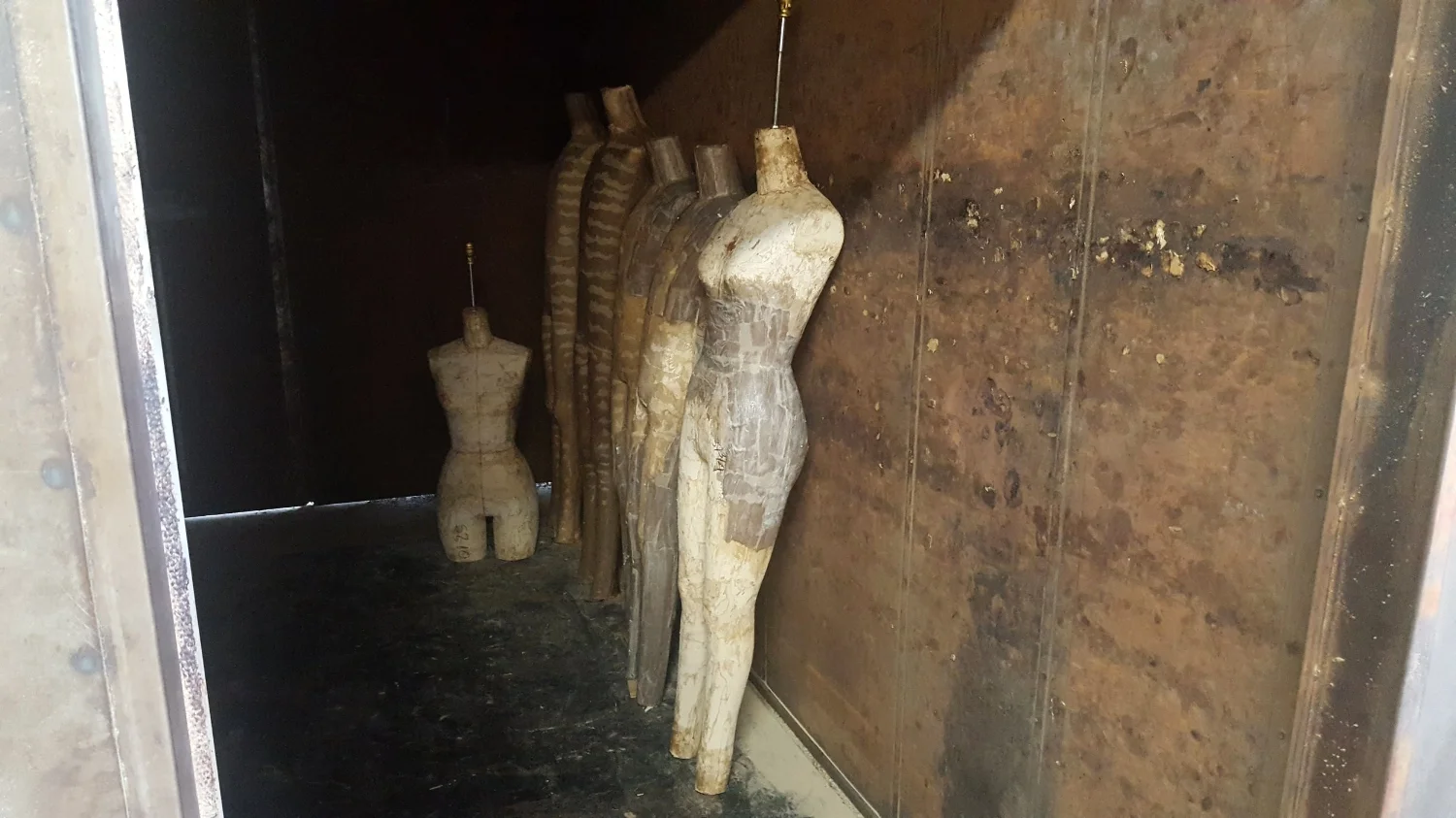 The next stage is similar to papier mâché. The forms are then baked in an oven and cooled overnight.