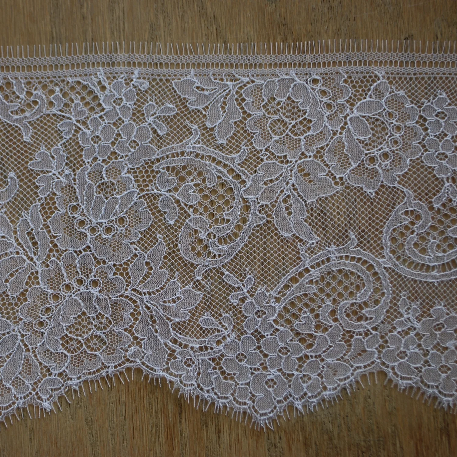 Chantilly is an extremely fine bobbin lace. It is so soft you can sleep in it. 