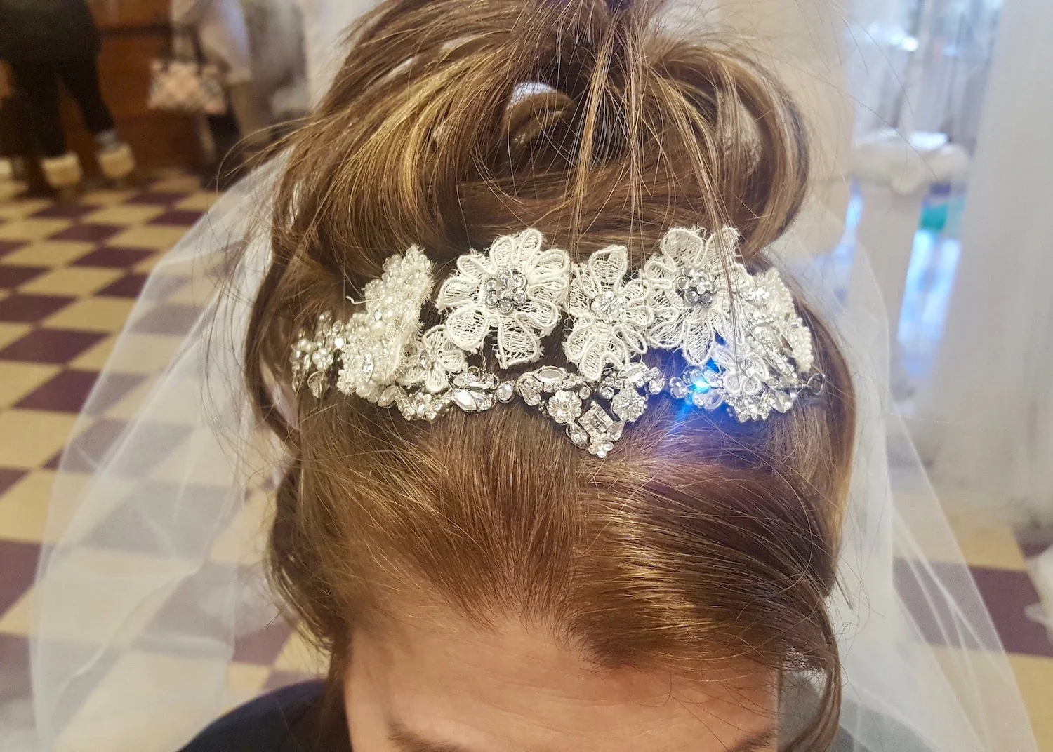Our “Grace” headpiece can also be styled to be worn in the front of an updo.