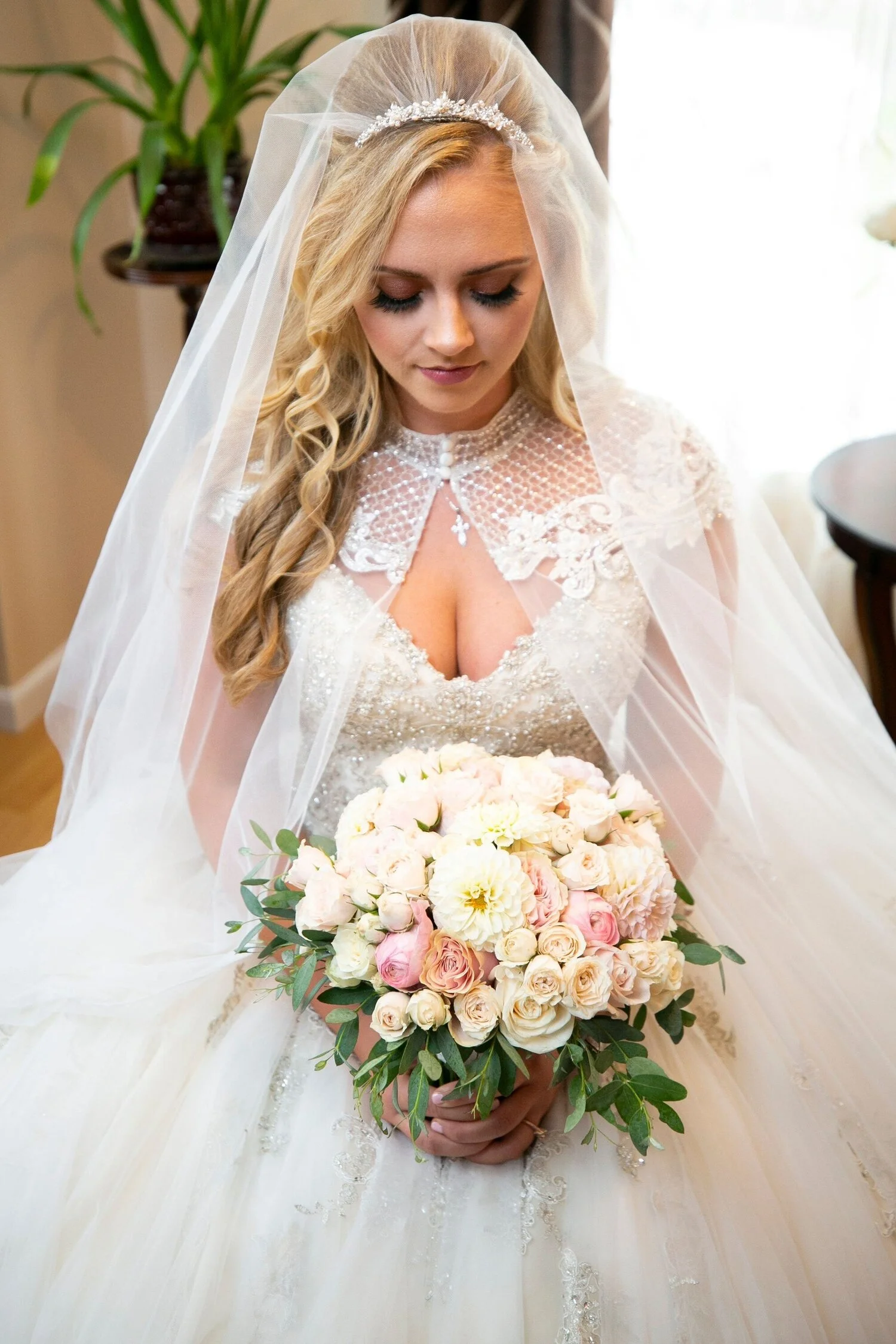 By coincidence, Natalie happened to pose the same way for a photo on her wedding day.