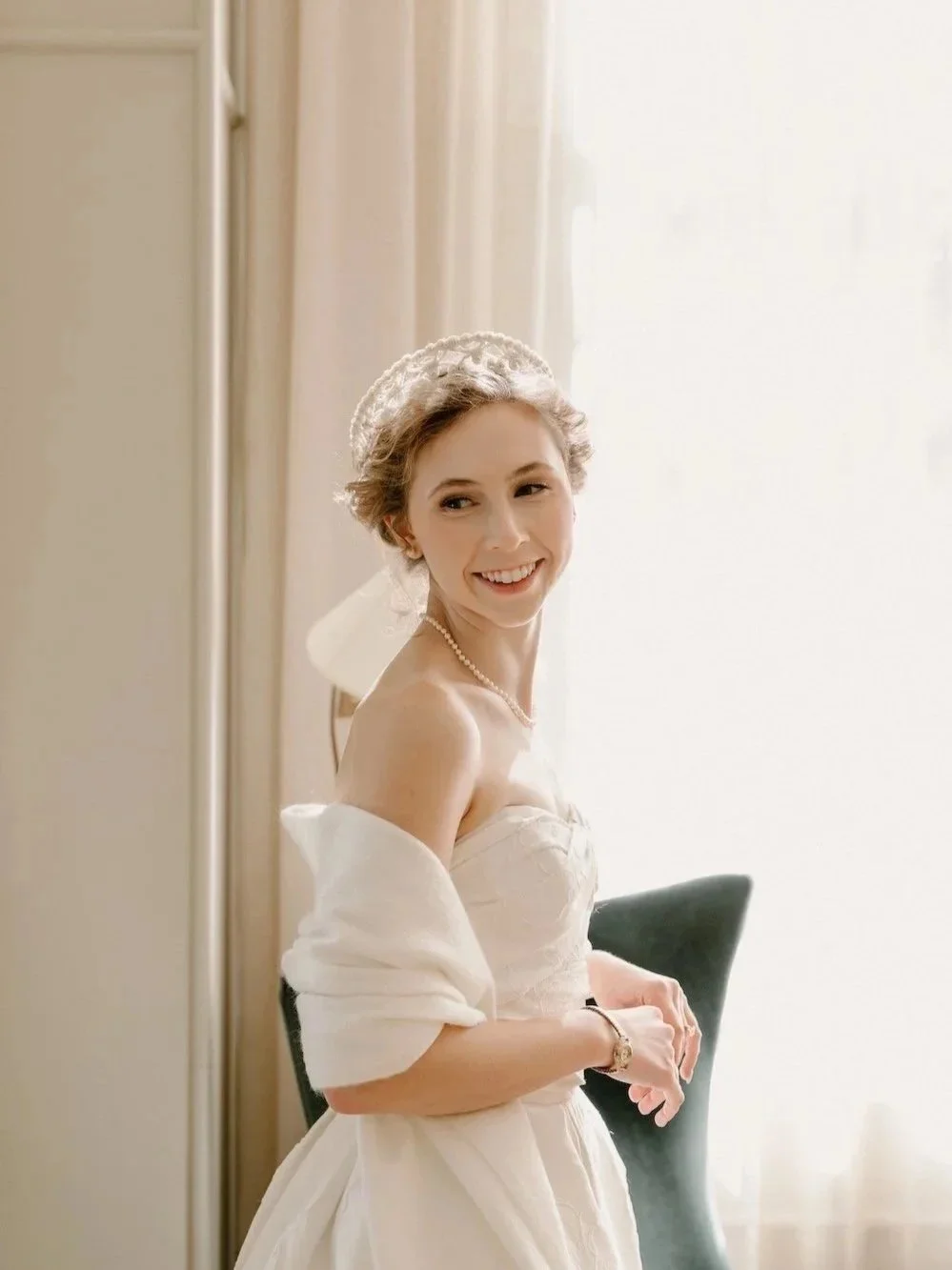 Bride with a beautiful smile wearing her grandmother's bridal headpiece.