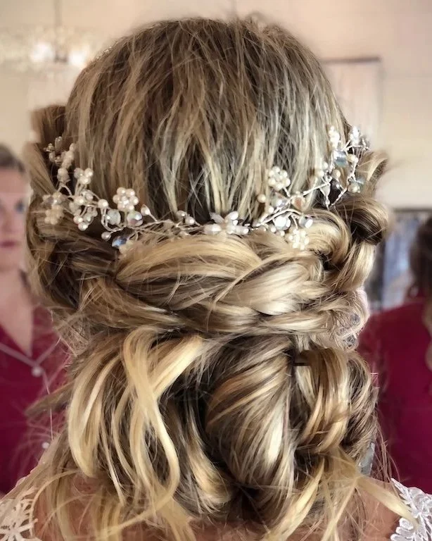 Bride wearing ethereal vine-style headpiece repurposed from grandmother's 1960 wedding crown.