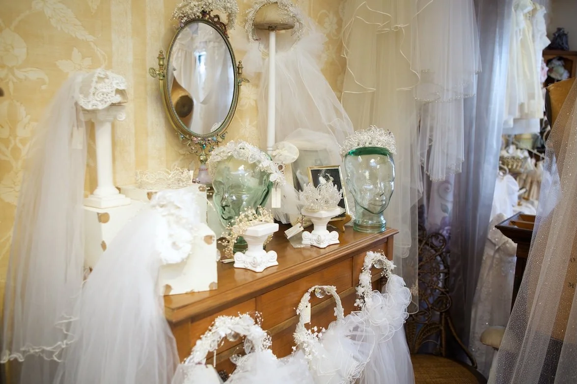 Collection of vintage bridal headpieces and wedding crowns waiting to be restored.