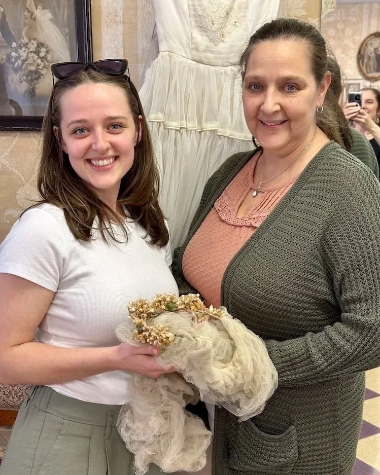 Bride-to-be and her mom holding a 1941 wax flower crown in dire condition at Headpiece.com.