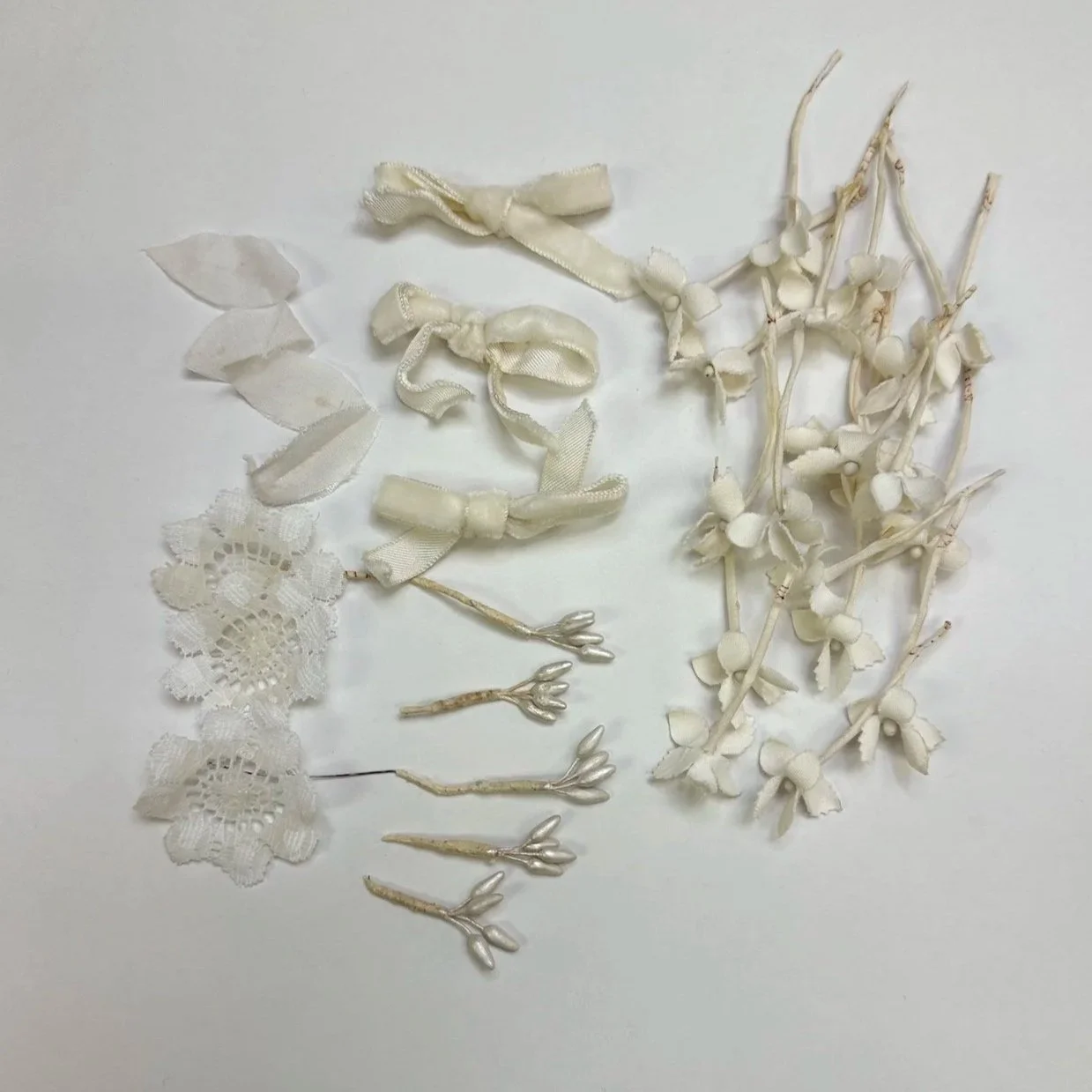 Deconstructed elements from a vintage 1980 headpiece.