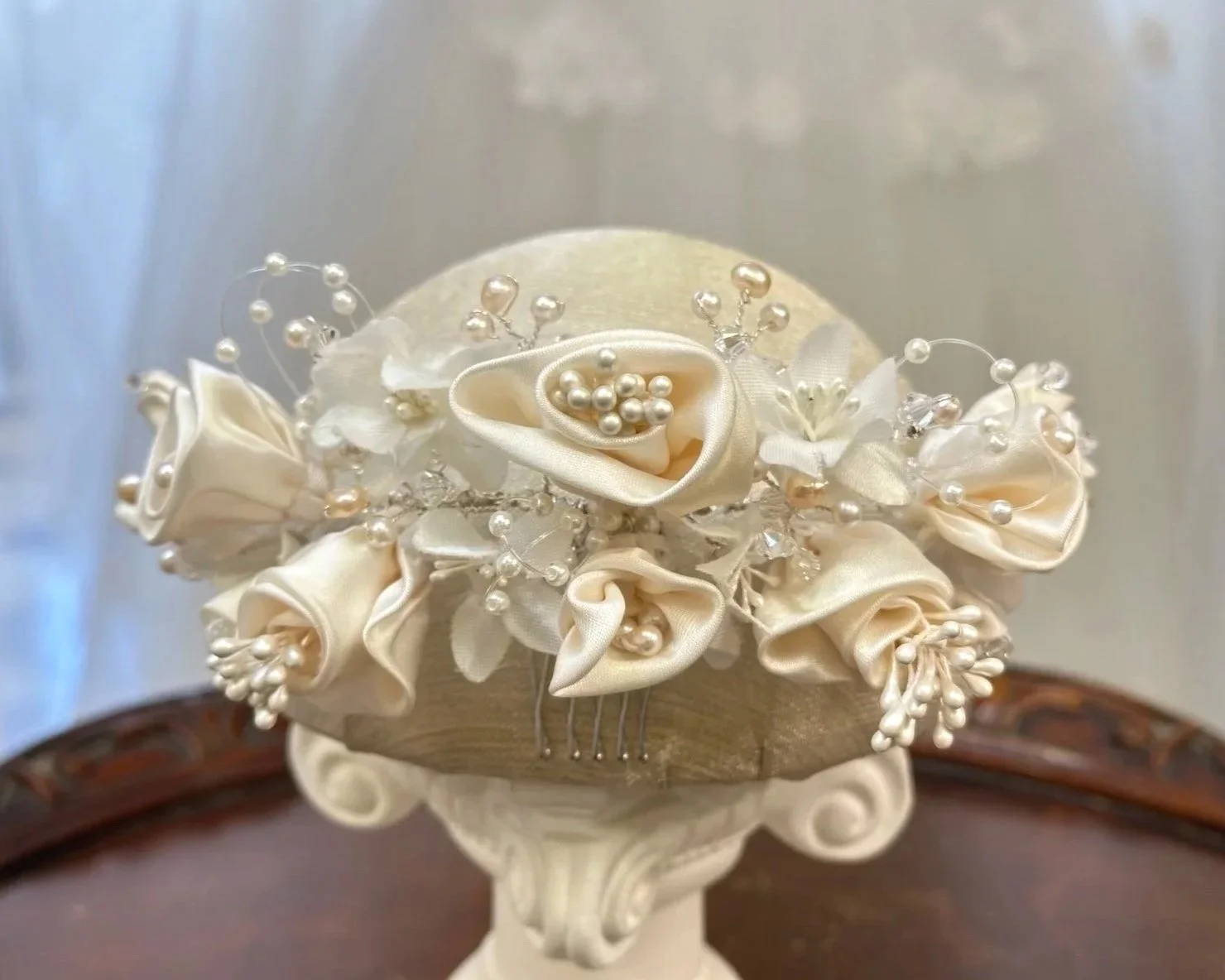 Vintage blush floral bun wrap repurposed into an ethereal bridal headpiece with crystal and blush pearl accents.