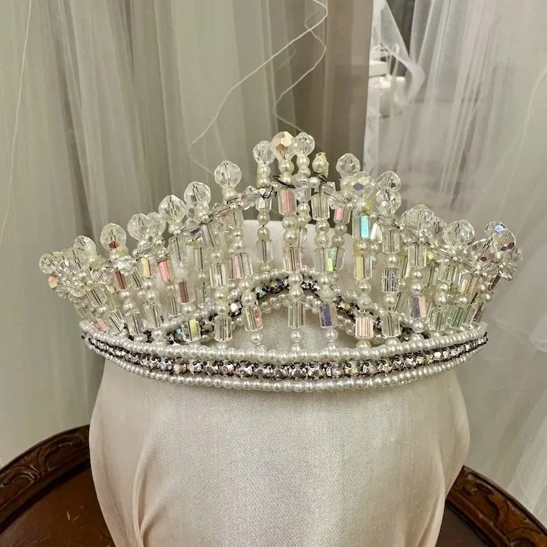 Vintage 1960 wedding crown with blackened wire and discolored yellowed crystals, missing pearls.
