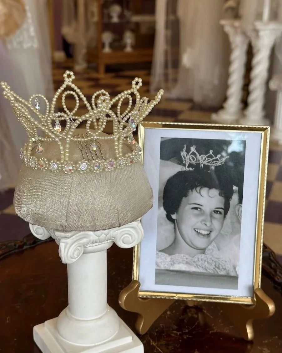 Stunning pearl and crystal wedding crown recreated from a wedding photo shown in a frame.