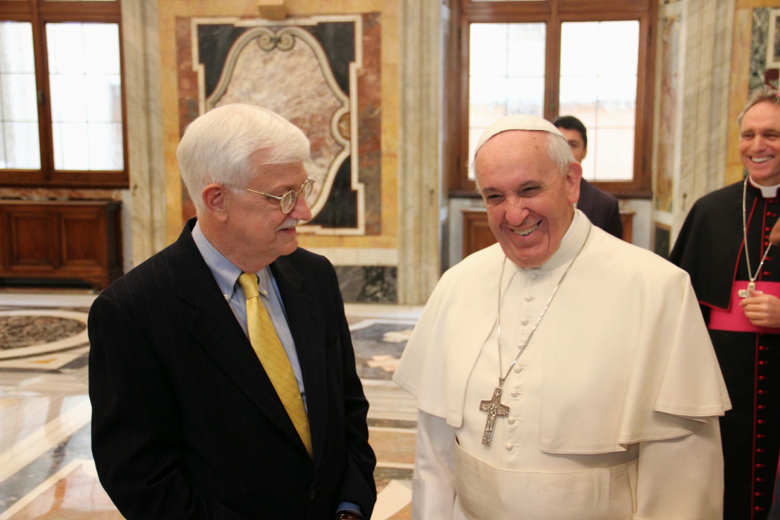  Tom Farr talks with Pope Francis during a special audience at the Vatican. 