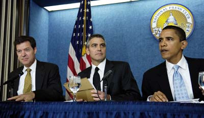 Senator Sam Brownback with then-Senator Barack Obama and actor George Clooney at 2006 press conference to raise awareness of Darfur crisis and genocide. Photo: AP