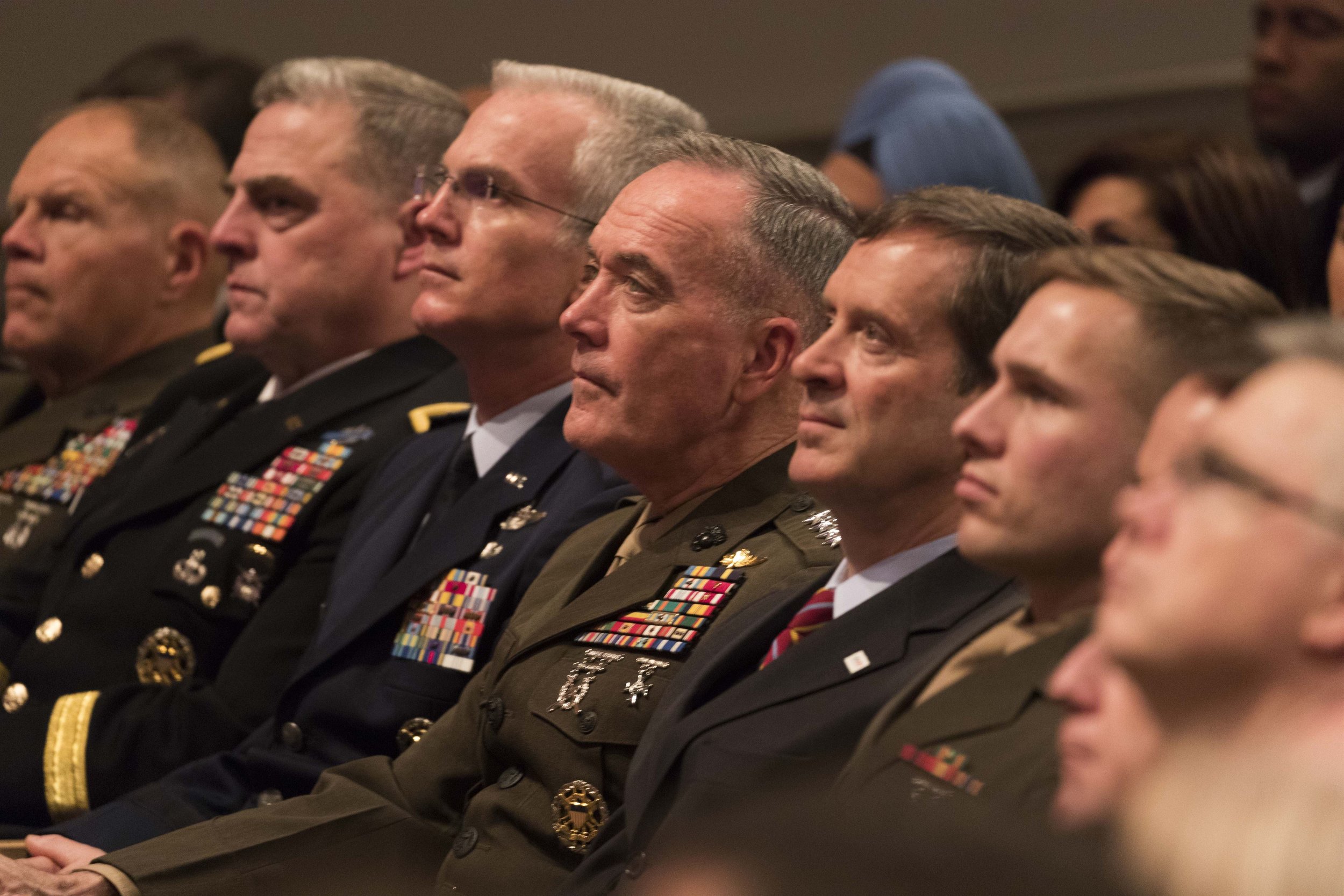 Chairman of the Joint Chiefs of Staff Marine Corps Gen. Joe Dunford, center, and members of the Joint Chiefs of Staff listen as President Donald J. Trump announces a new National Security Strategy, Dec. 18, 2017.Photo: Defense.Gov/Joyce N. Boghosian…