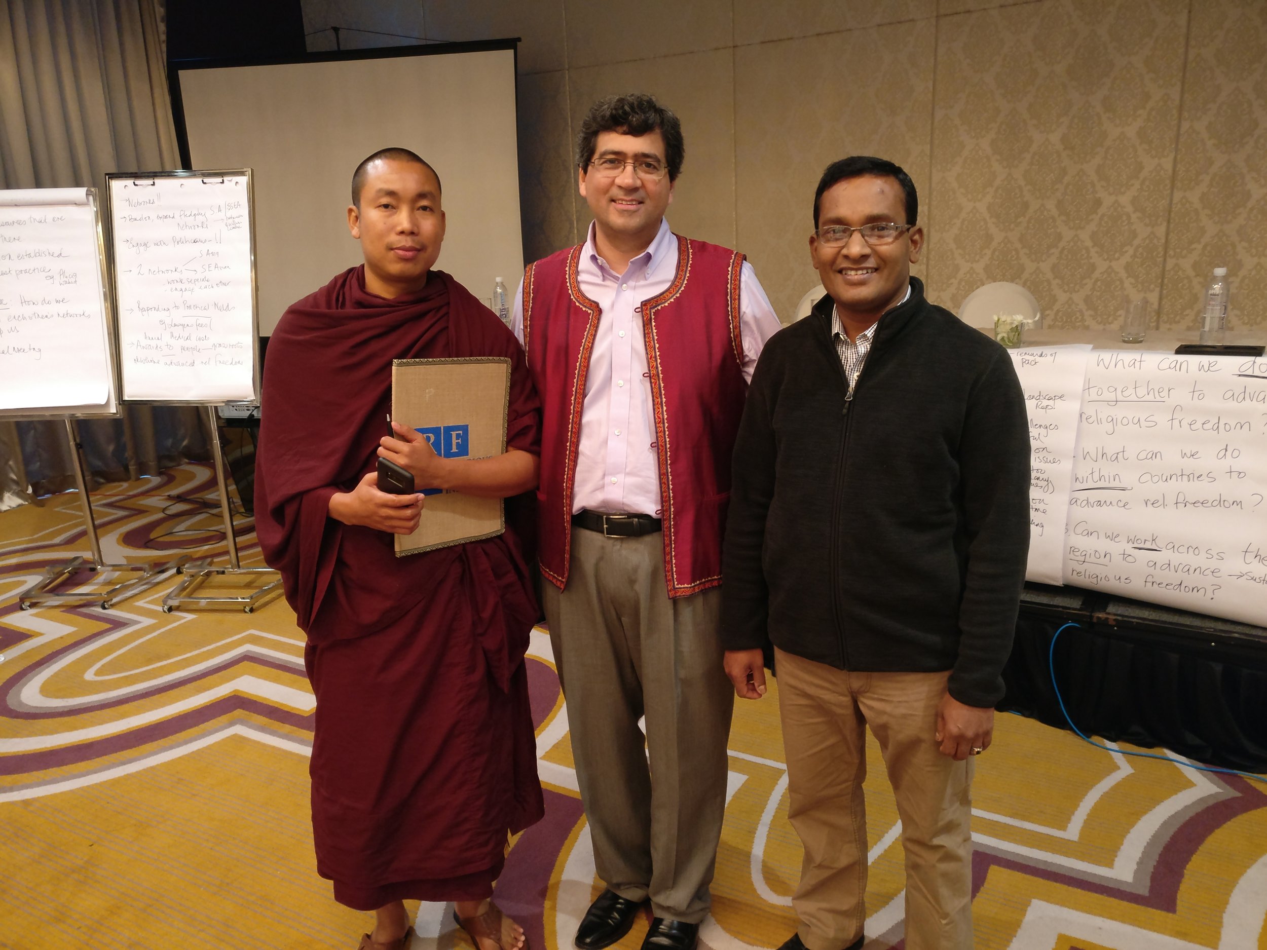 Ashin Zero and Sam Naeem with RFI Action Team Director Timothy Shah. (Photo: RFI)