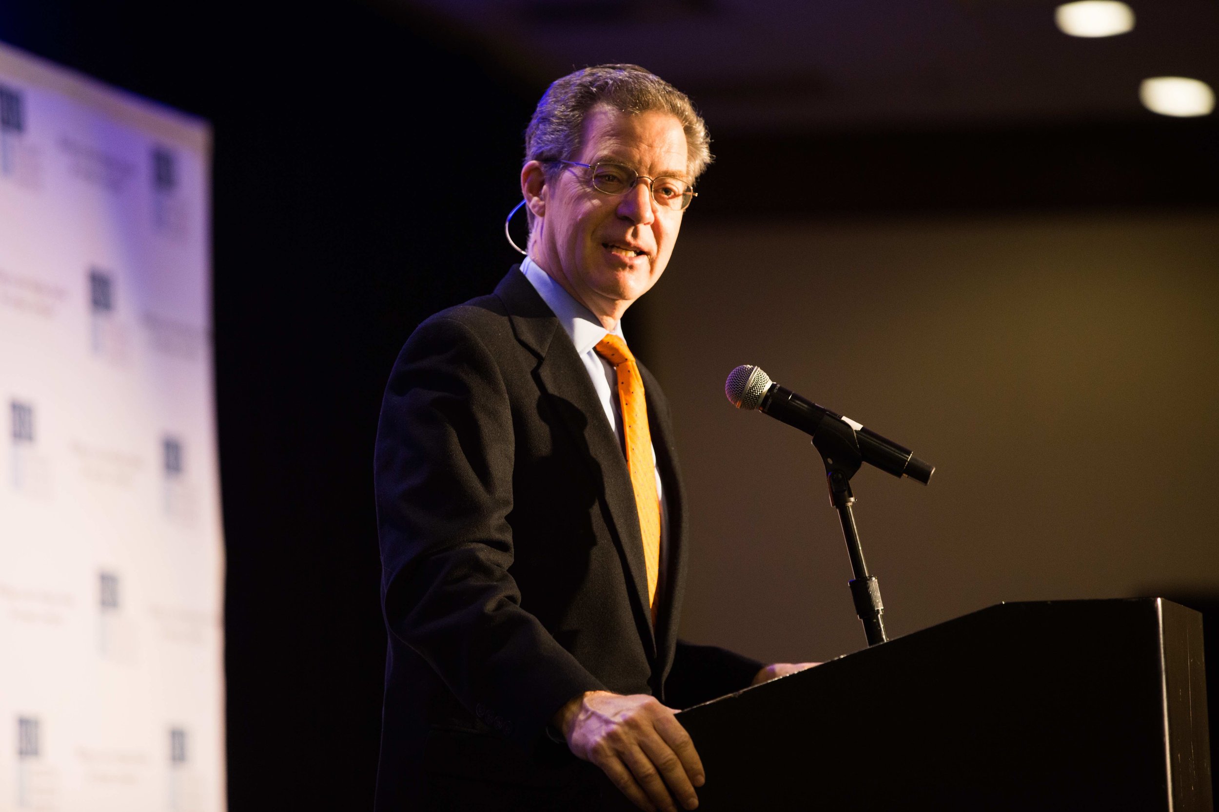 Sam Brownback, Ambassador at Large for International Religious Freedom gives the opening keynote address. Photo: RFI/Margaret Wroblewski