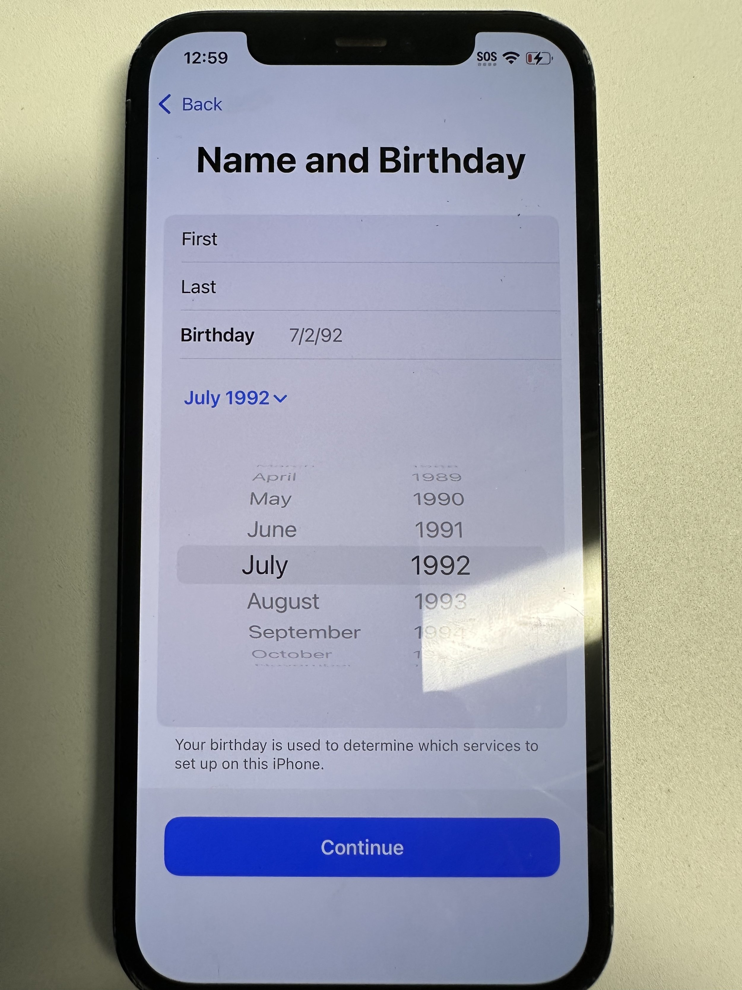 enter birthdate. if unsure, set something above 21 years old and ask the user to fix on https://account.apple.com/ later.