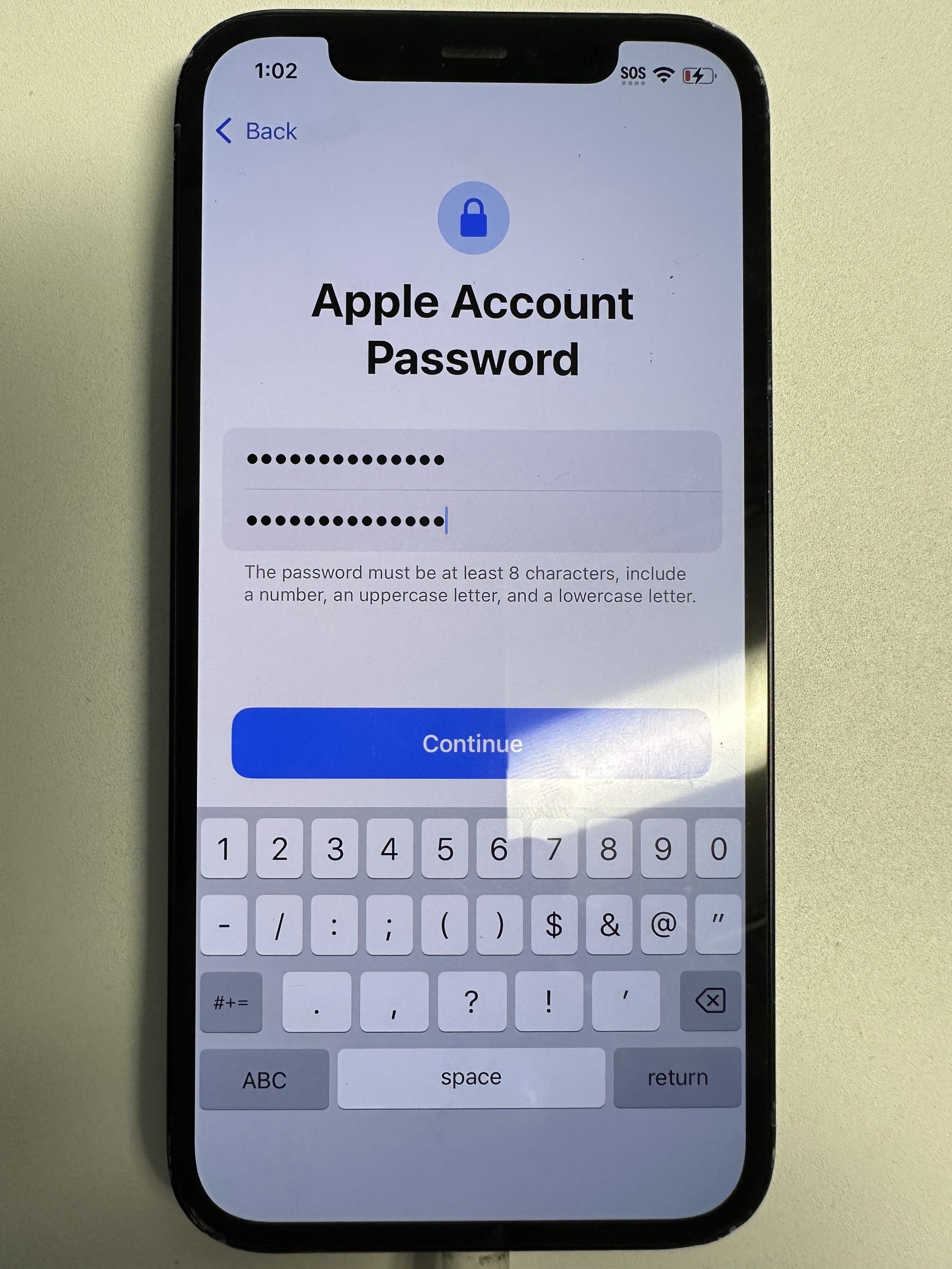 This password does not sync with anything else. You are responsible for remembering your Apple ID/PW. No one else has any means of resetting for you. They will be necessary when returning the device.