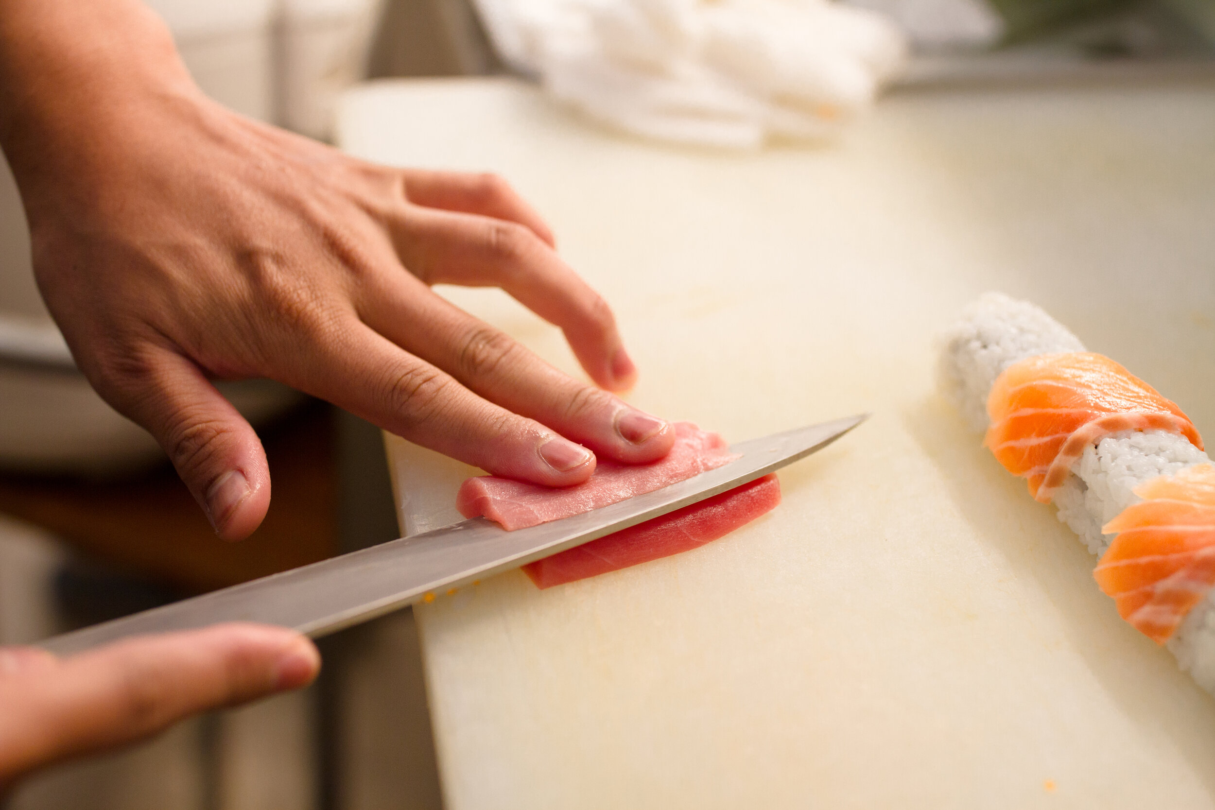 Close-up-on-the-hands-of-the-Japanese-sushi-sashimi-chef-'s-knife.-964256620_5184x3456.jpeg