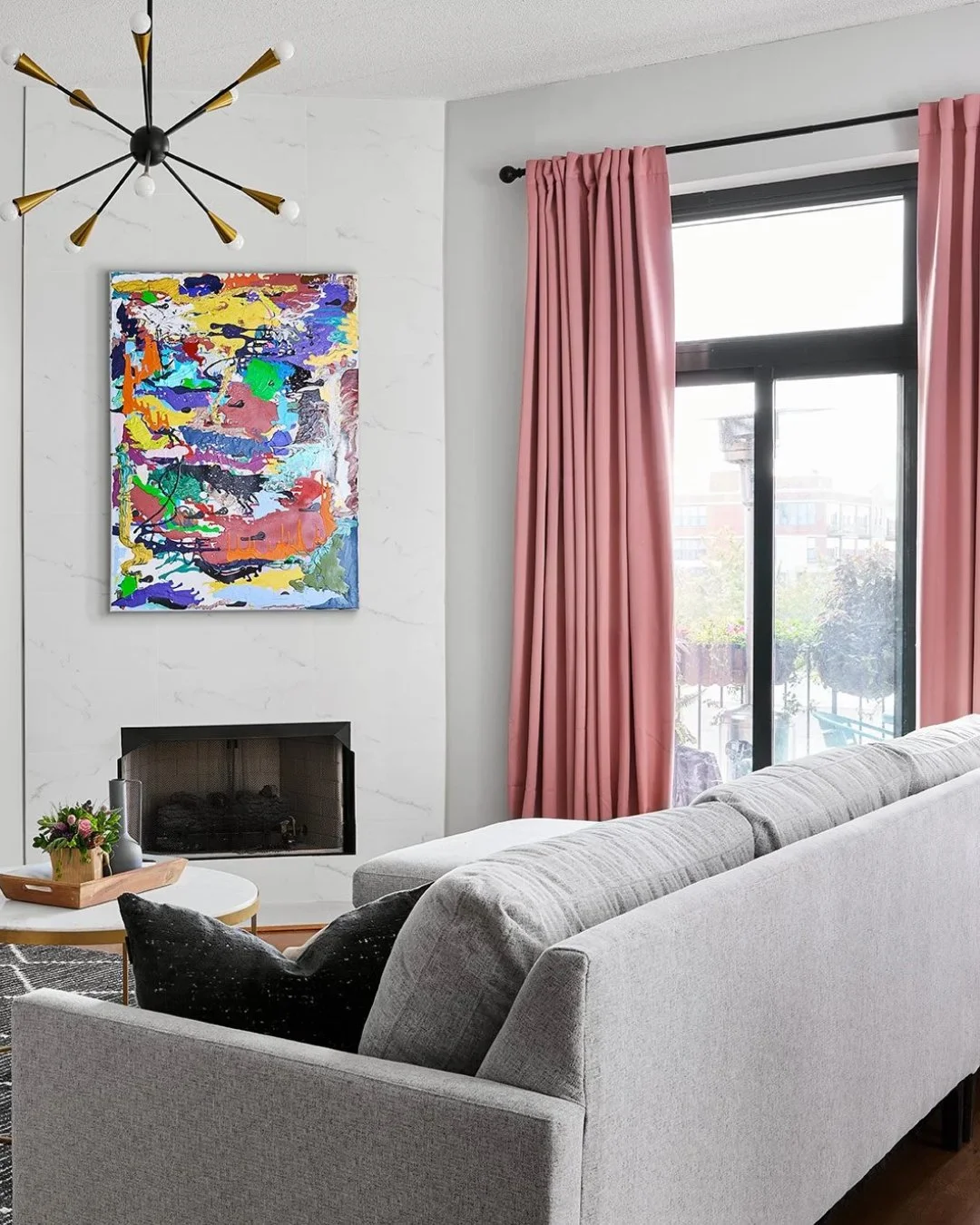 A modern living room with subtle touches of color feels composed, refined, and full of quiet personality. The palette adds interest without overwhelming the space, creating a look that feels elevated, balanced, and effortlessly stylish. 

#ModernInte