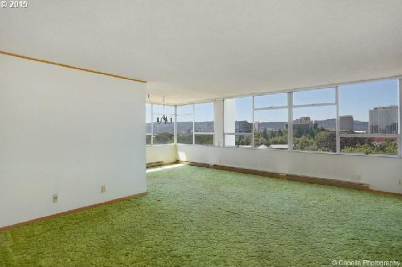 The green shag has been replaced with new cork flooring. Image courtesy of RMLS.