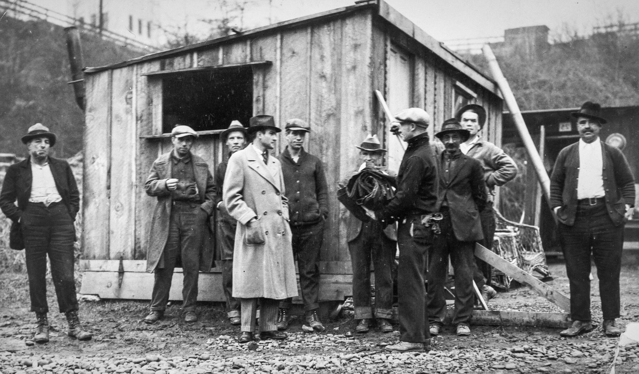 1933 “Boss” of Sullivan’s Gulch unemployed receives new overalls for men from Russ Broyly OHS ba025003.jpg