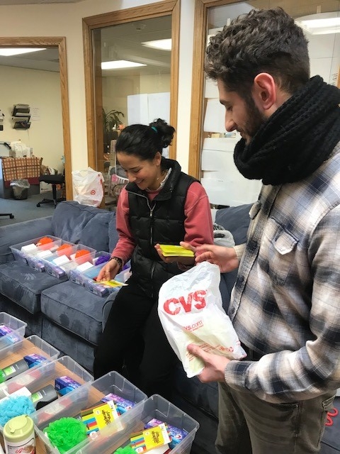 SHARE organizers Jihelah and Dylan put together care kits