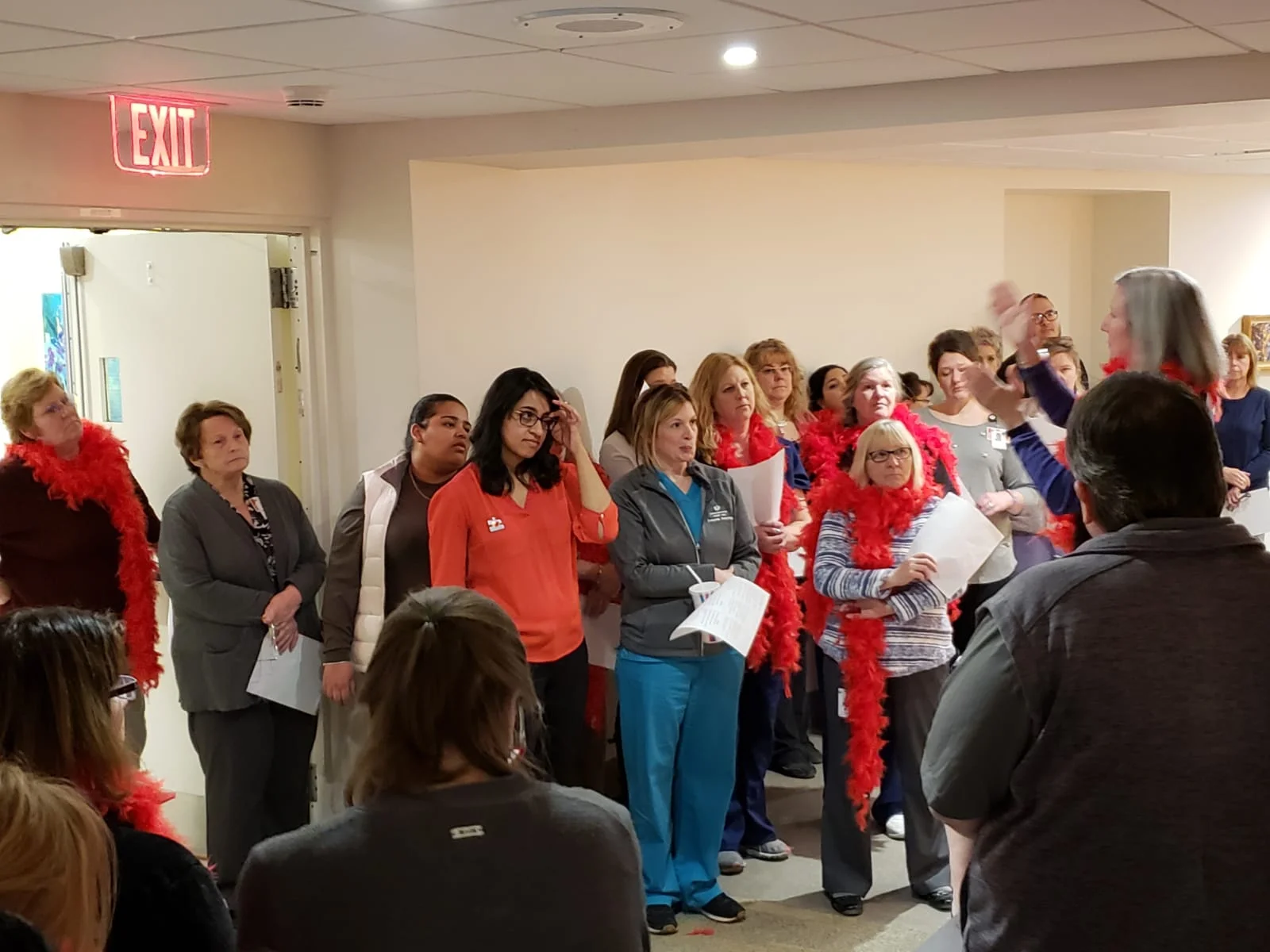 SHARE Organizer Janet Wilder gives a Negotiations update to SHARE singers at the Memorial campus.
