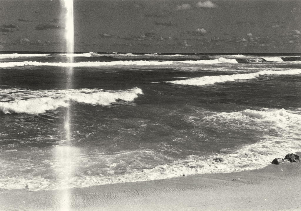  Two photos of the ocean are found, reworked and represented. First with a light stain; the with chemical erosion. 