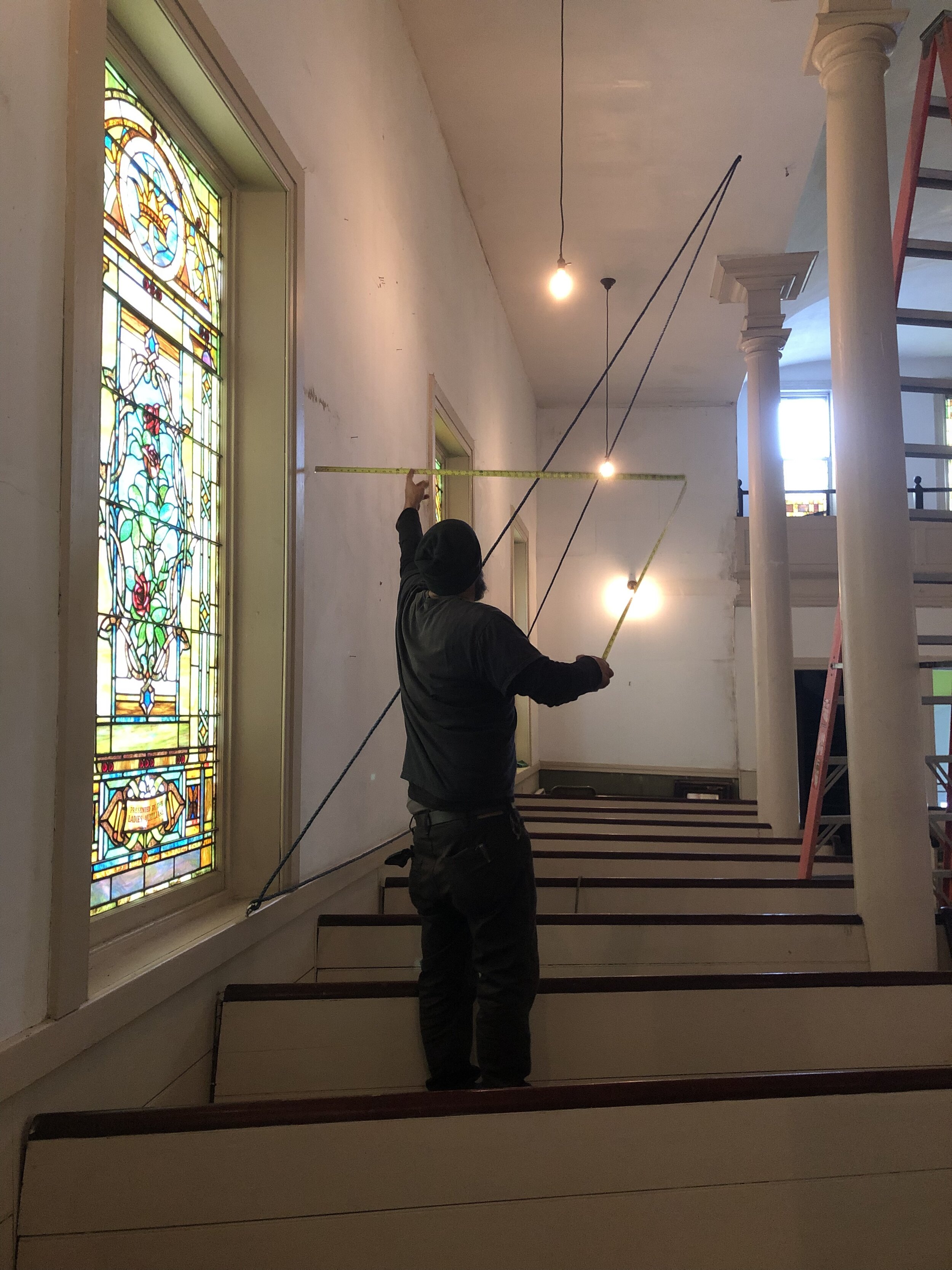 Working within the framework of the church’s space: the vaulted ceilings, pillars and columns, and inspired by stained glass windows and their designs and colors, five principle geometric forms were constructed.
