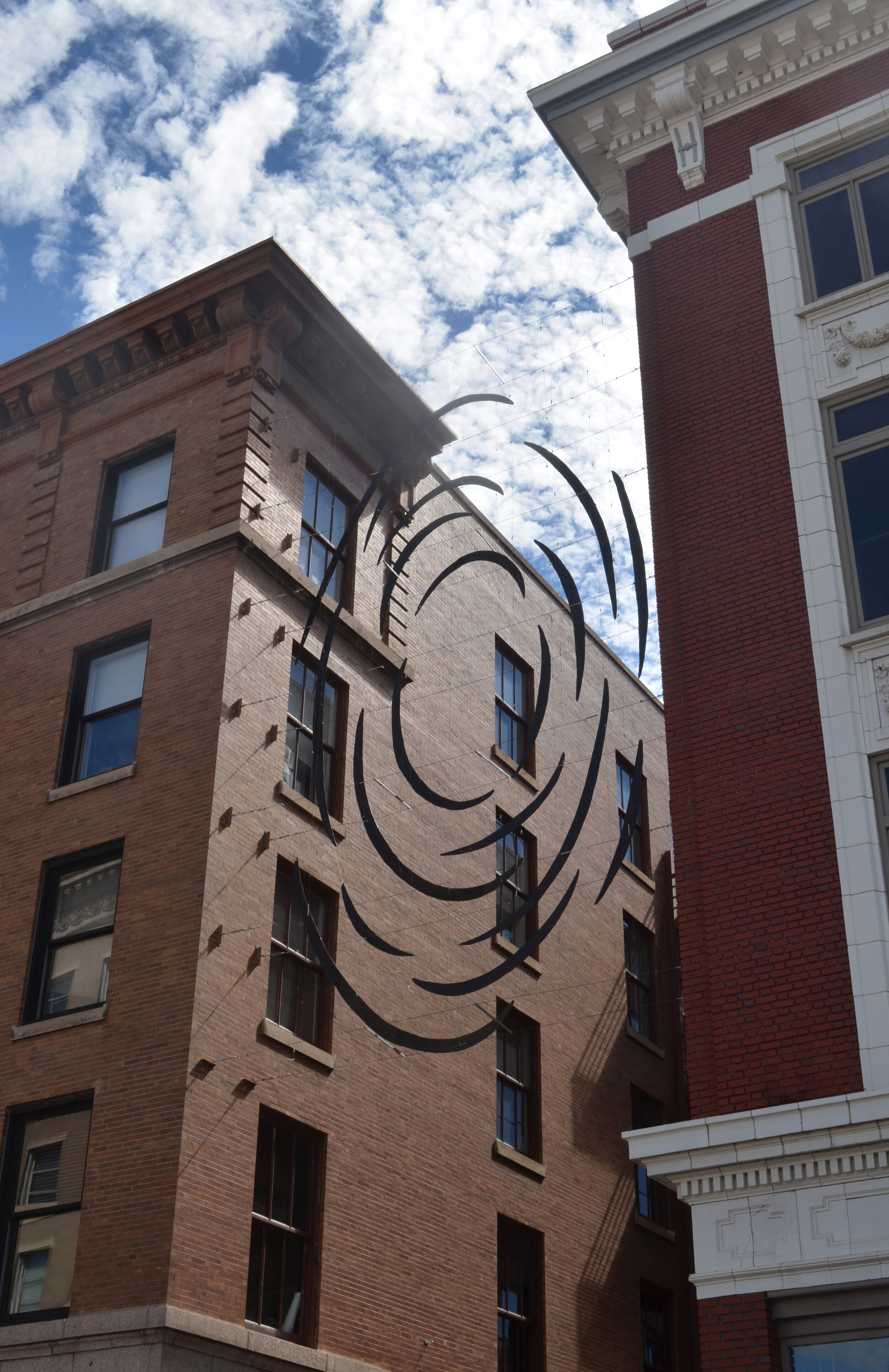  Vitrail  was commissioned for Art on the Streets, a year long series of installations in Downtown Colorado Springs. BJM collaborated on the fabrication with Mitch Berg at Fuego, in the South Valley of Albuquerque.   Cut sheet metal on cables. 2020 